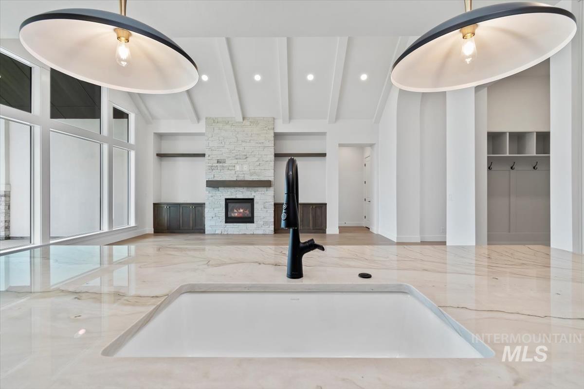 Unfurnished living room featuring recessed lighting and a fireplace
