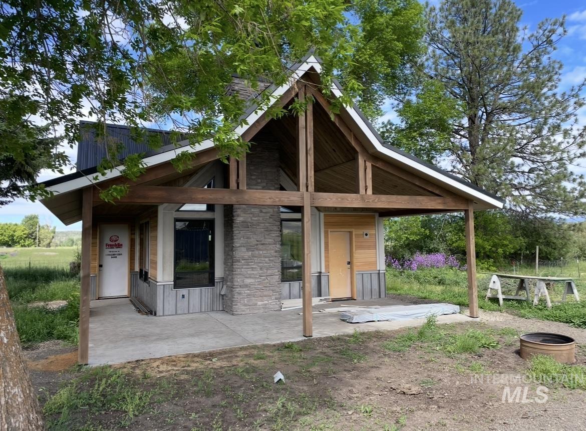 View of front facade with a patio