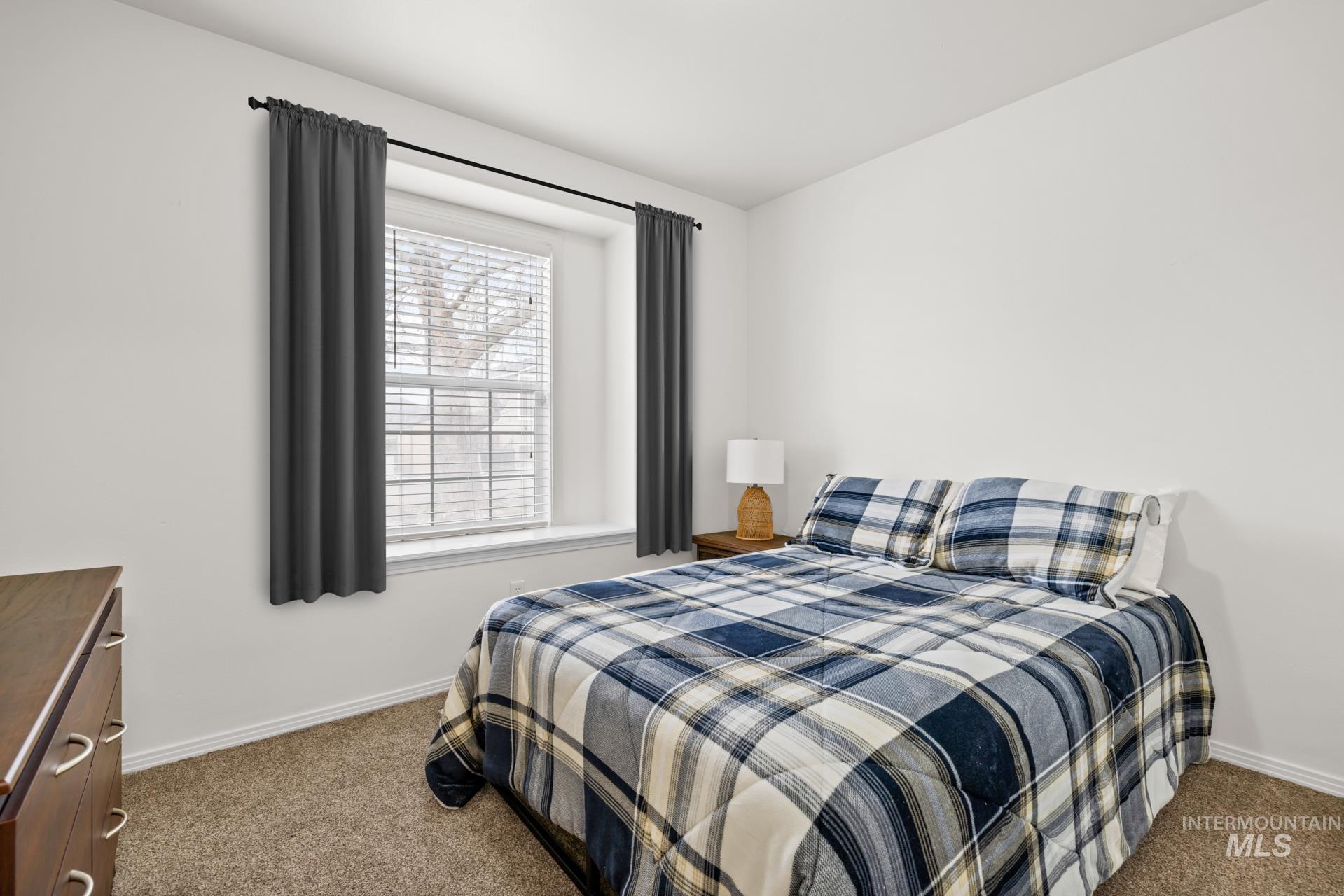 Bedroom featuring carpet floors