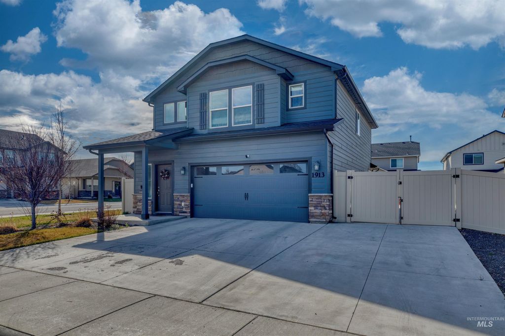 Photo of 1913 E Cave Falls St #Ashton 10/8, Kuna, ID 83634 (MLS # 98978701)