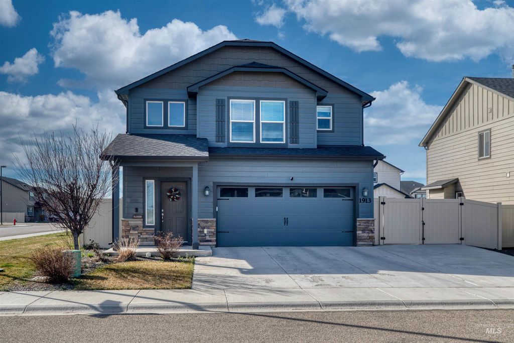 Photo of 1913 E Cave Falls St #Ashton 10/8, Kuna, ID 83634 (MLS # 98978701)