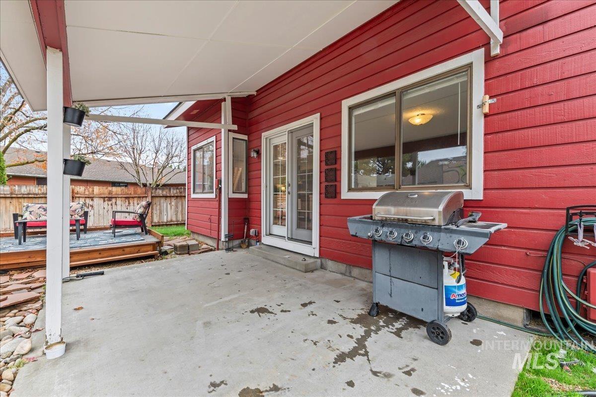 View of patio / terrace featuring grilling area and a deck