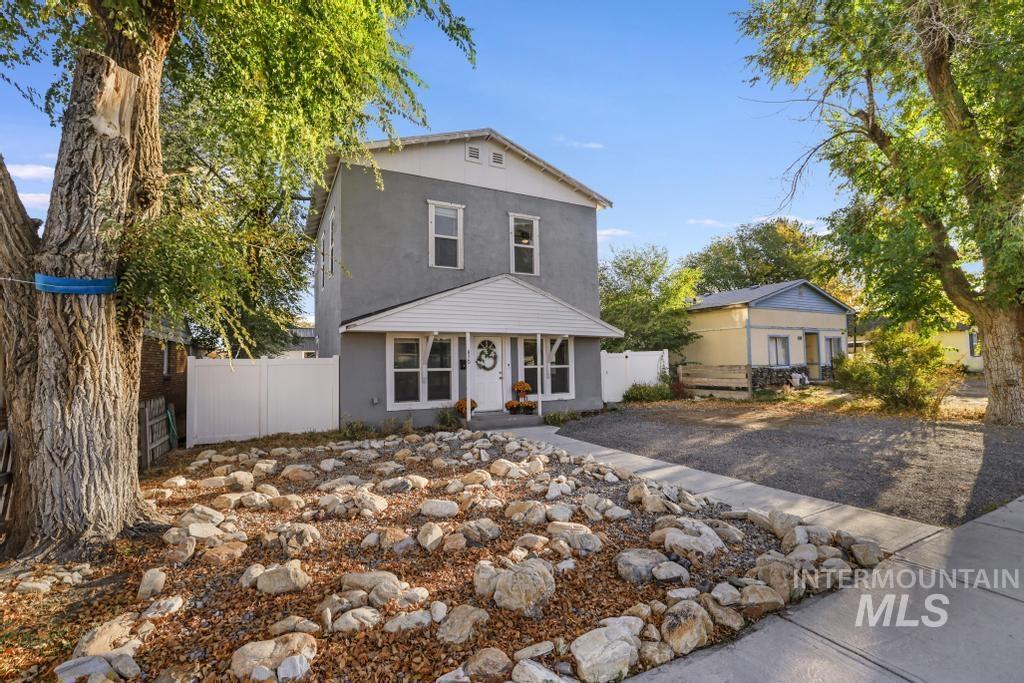 View of front of house featuring stucco siding