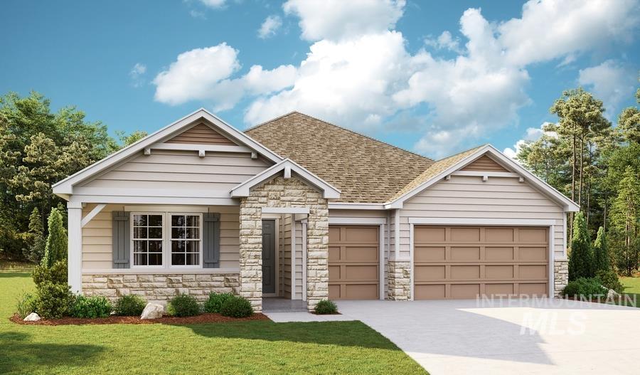 View of front of property with stone siding, a front yard, and a garage
