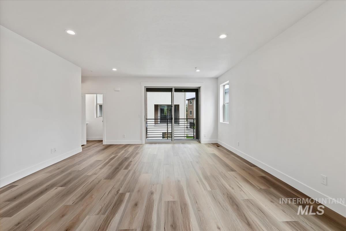 Unfurnished room featuring recessed lighting and light wood finished floors