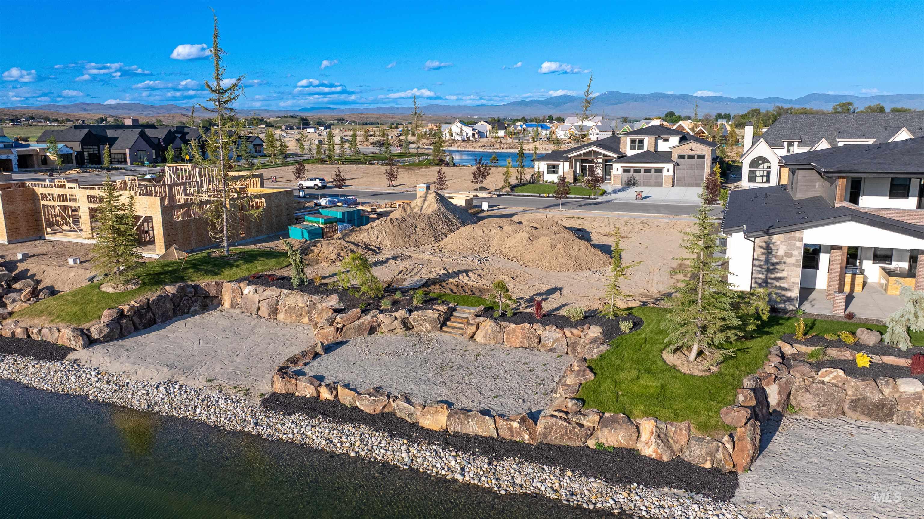 View of property location with nearby suburban area and a mountain backdrop