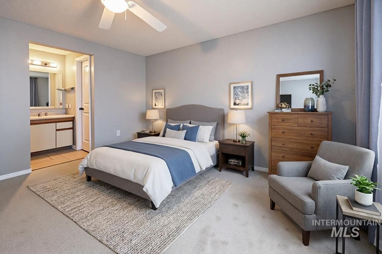 Bedroom with light colored carpet and ceiling fan