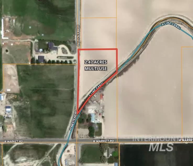 Aerial view of property's location featuring property parcel outlined