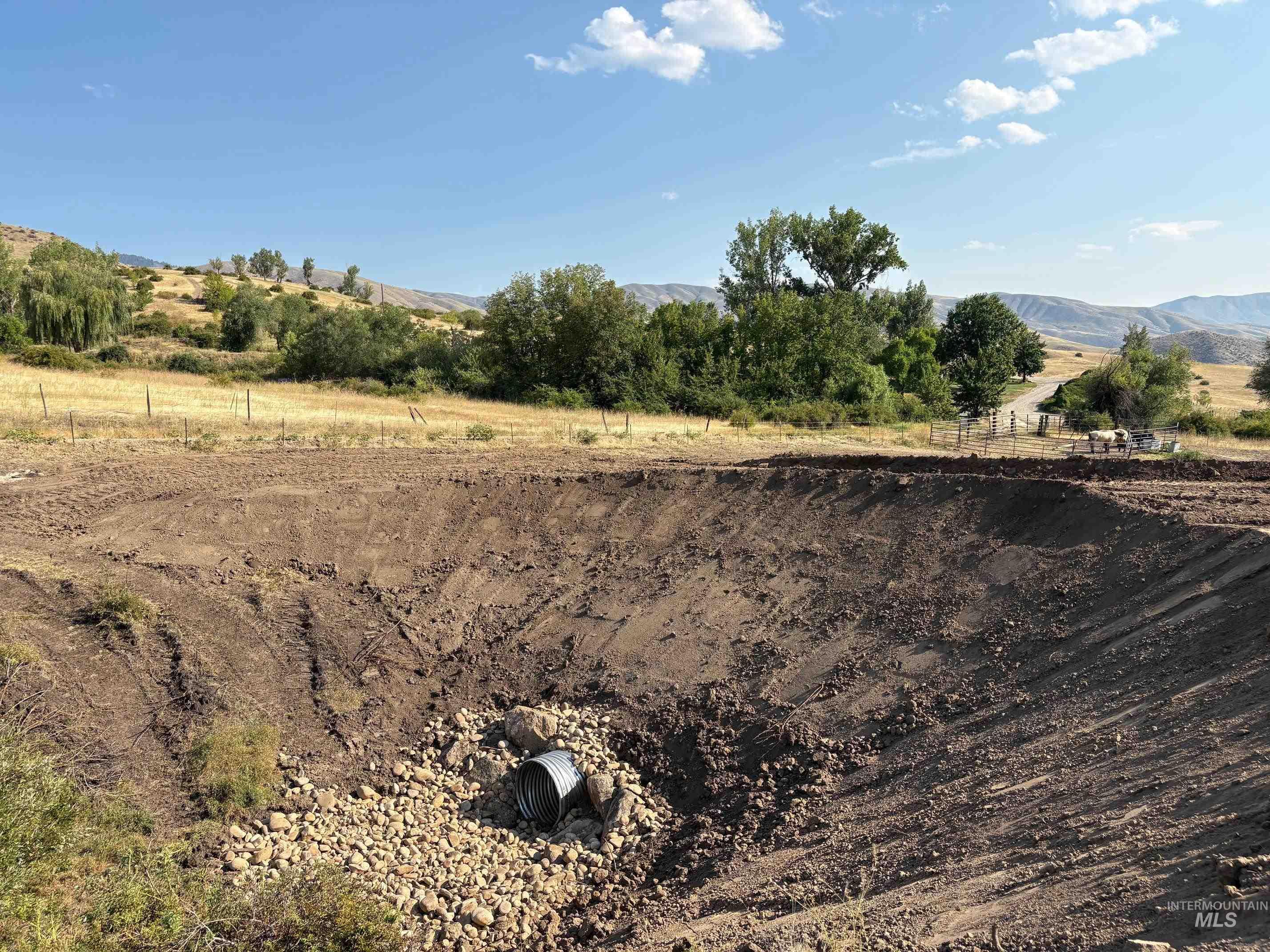 View of yard with a mountain view and a view of countryside