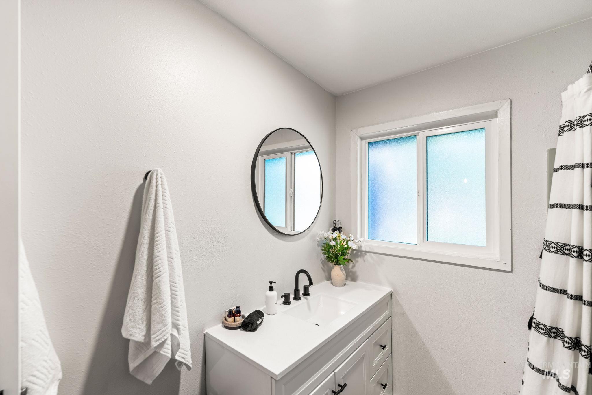 Full bath with vanity