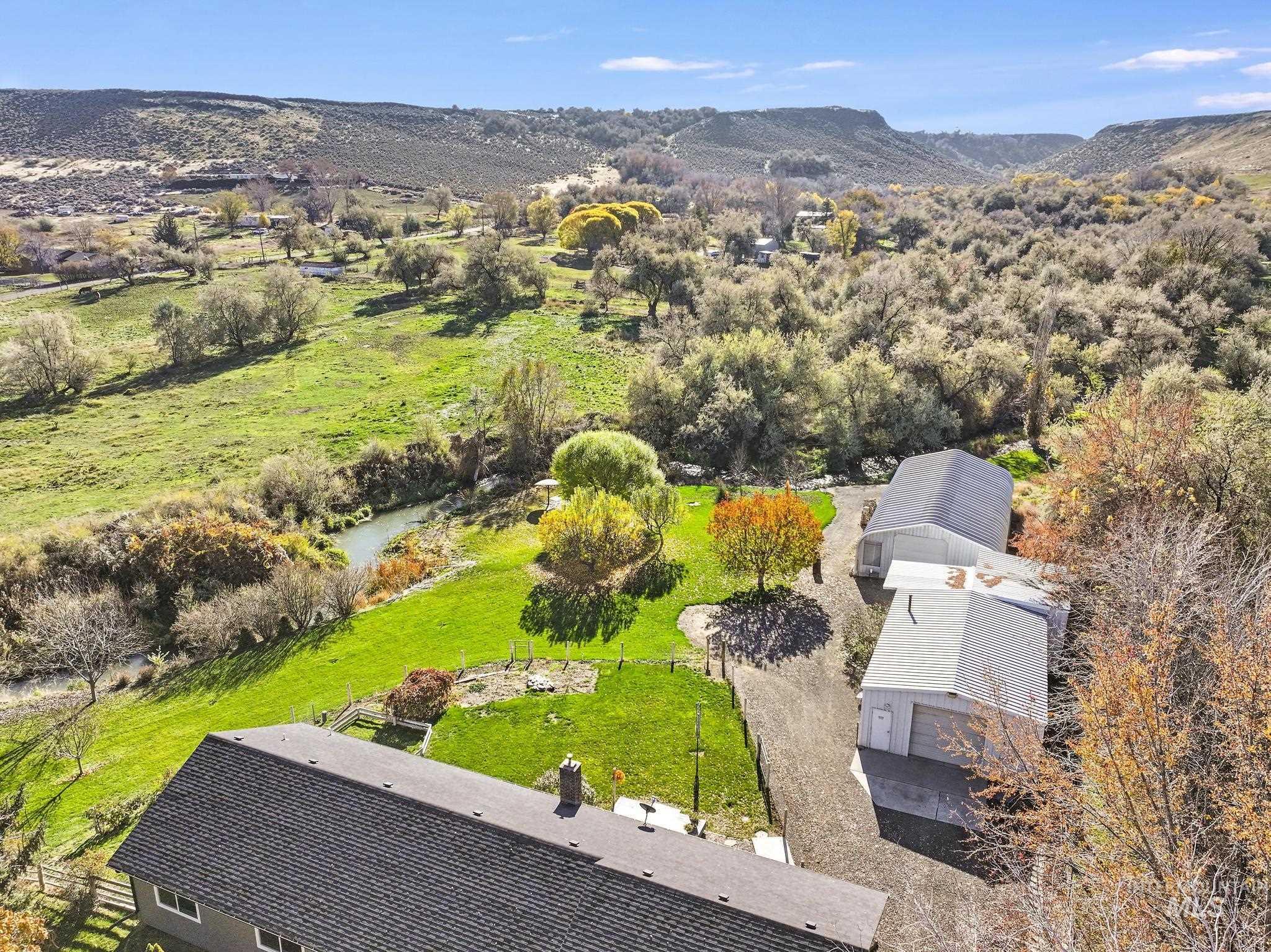 View from above of property featuring a mountainous background