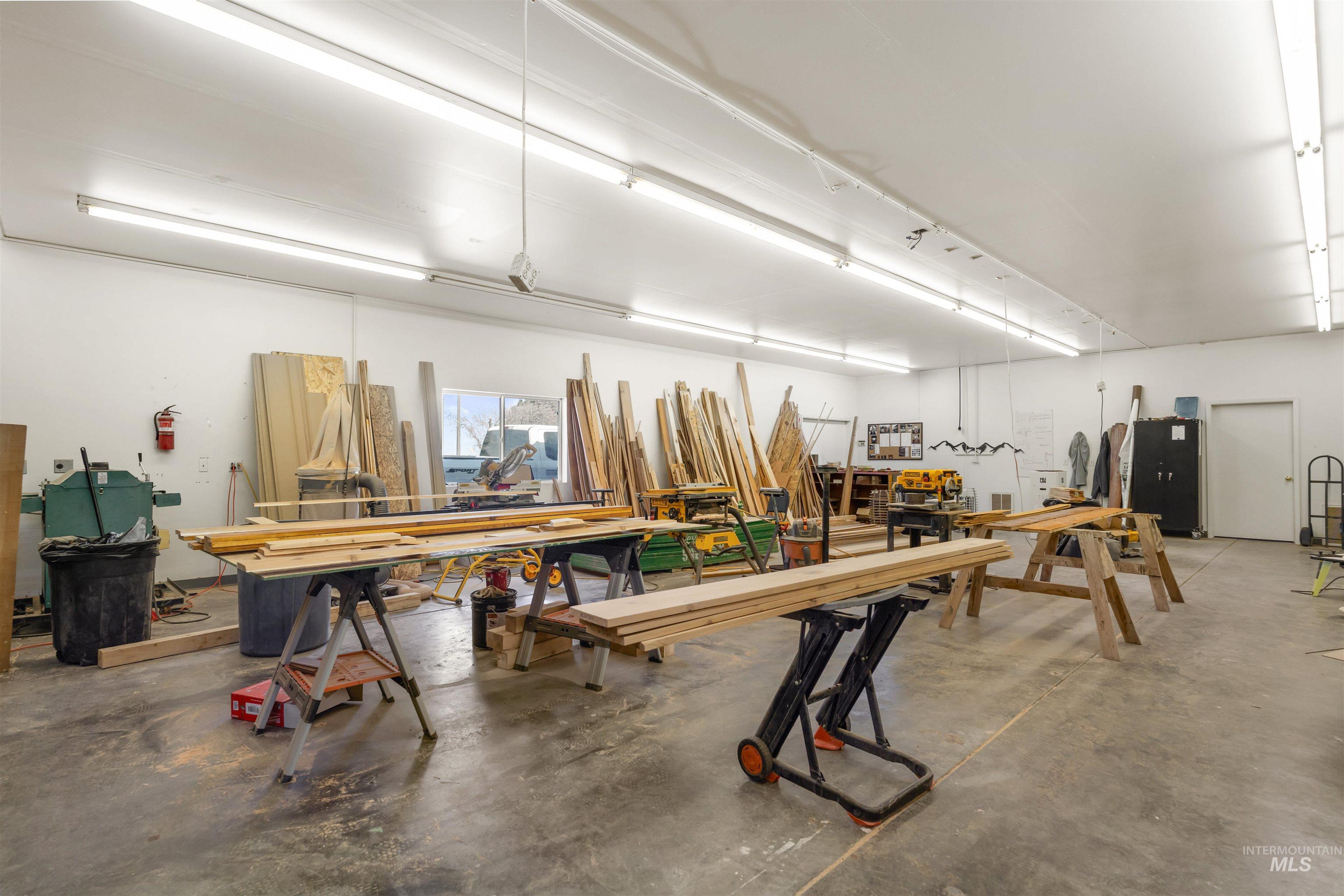 Garage featuring a workshop area