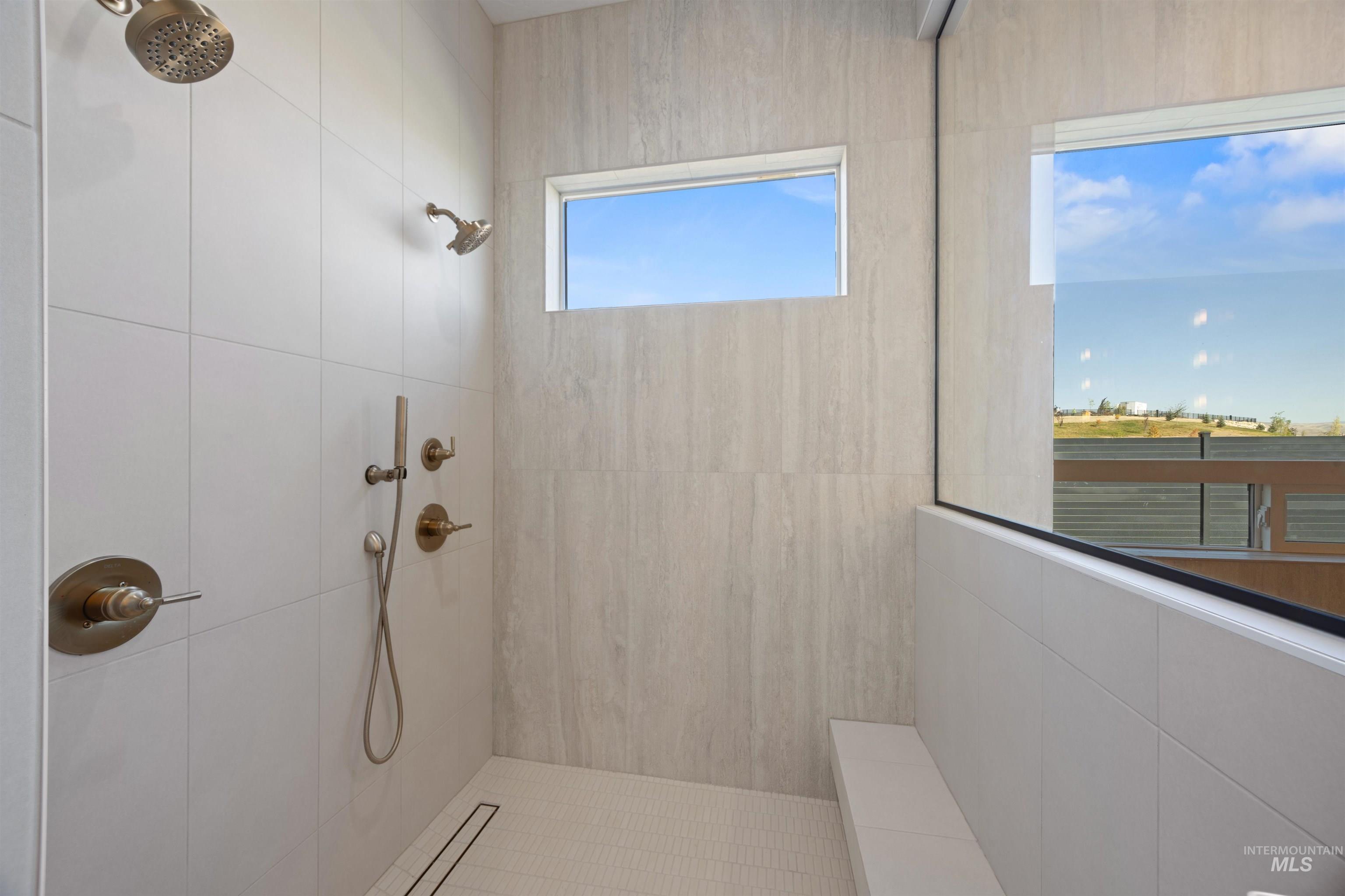 Bathroom with a tile shower