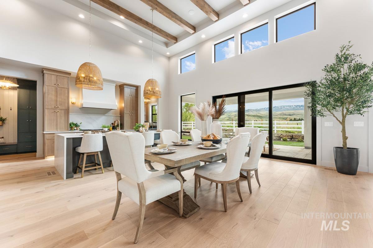 Dining room featuring light wood-style floors and recessed lighting