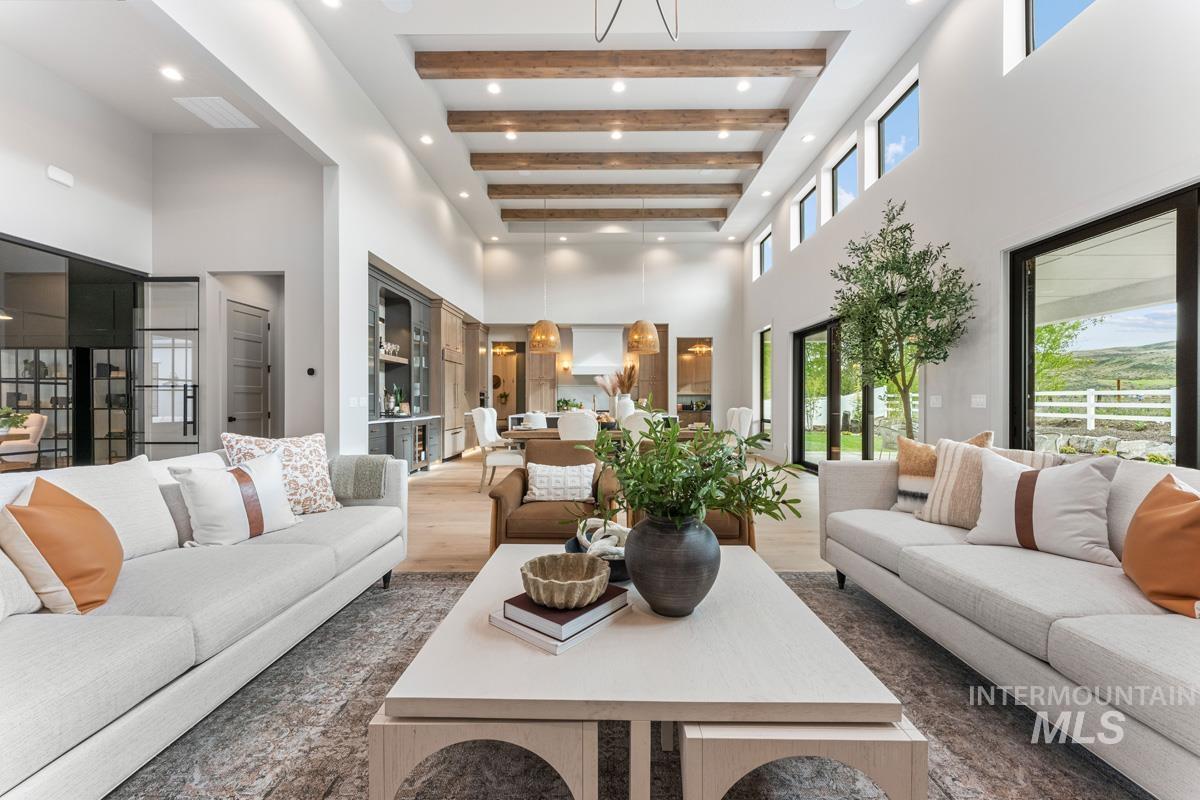 Living room with wood finished floors and recessed lighting