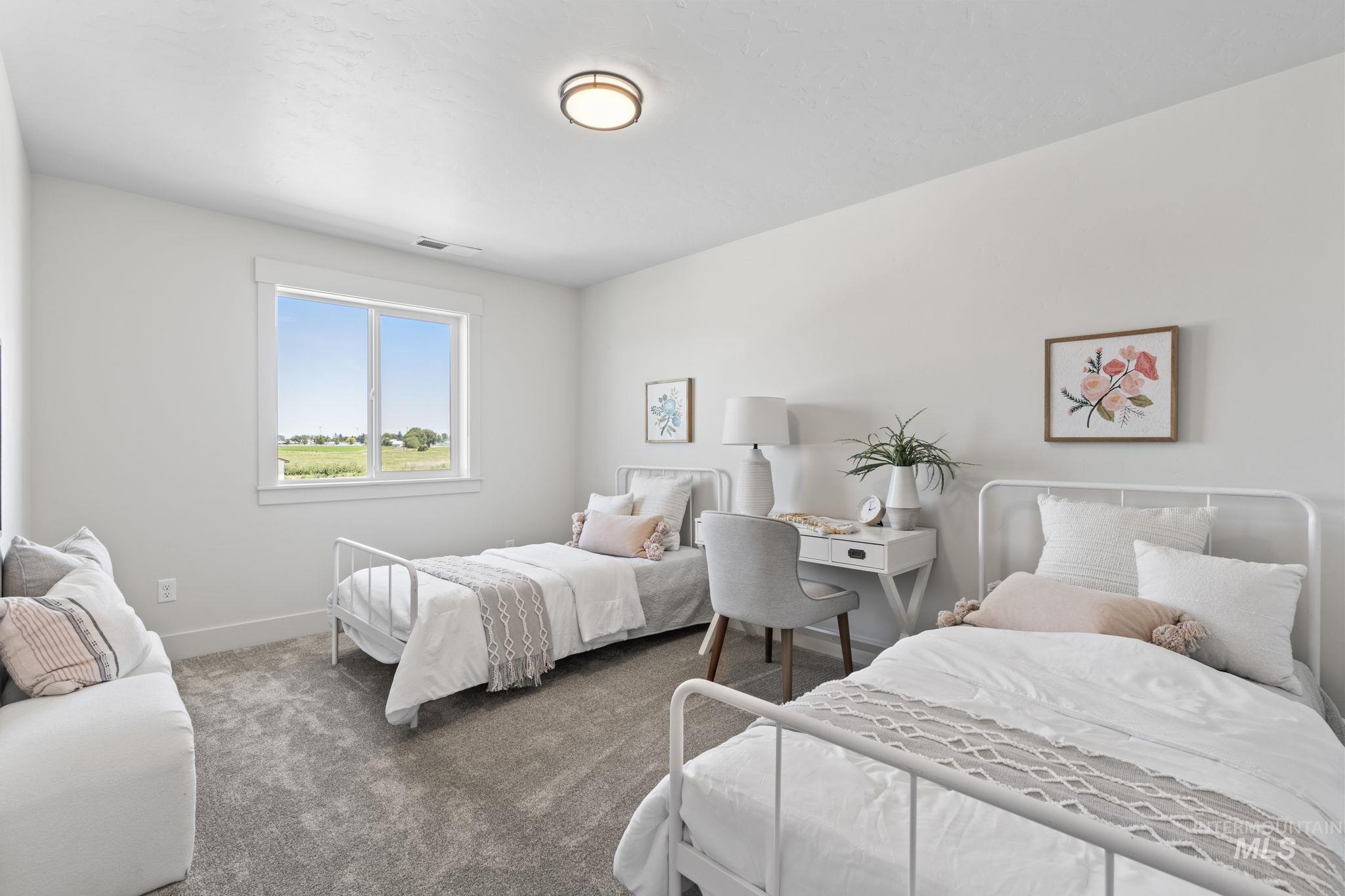 Bedroom with carpet and baseboards
