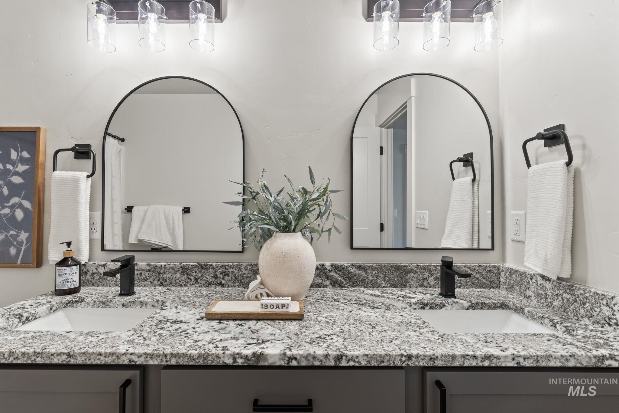 Bathroom featuring double vanity