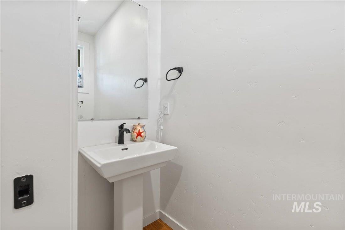 Bathroom featuring baseboards