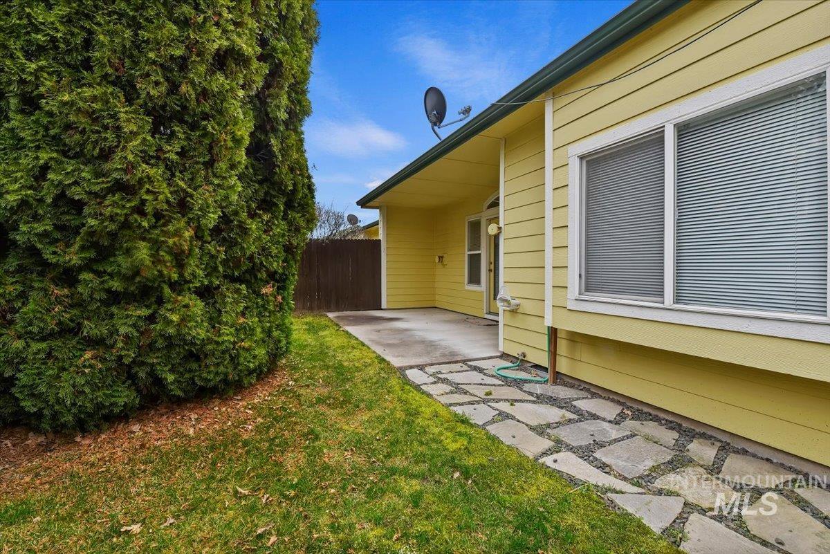 View of yard with a patio