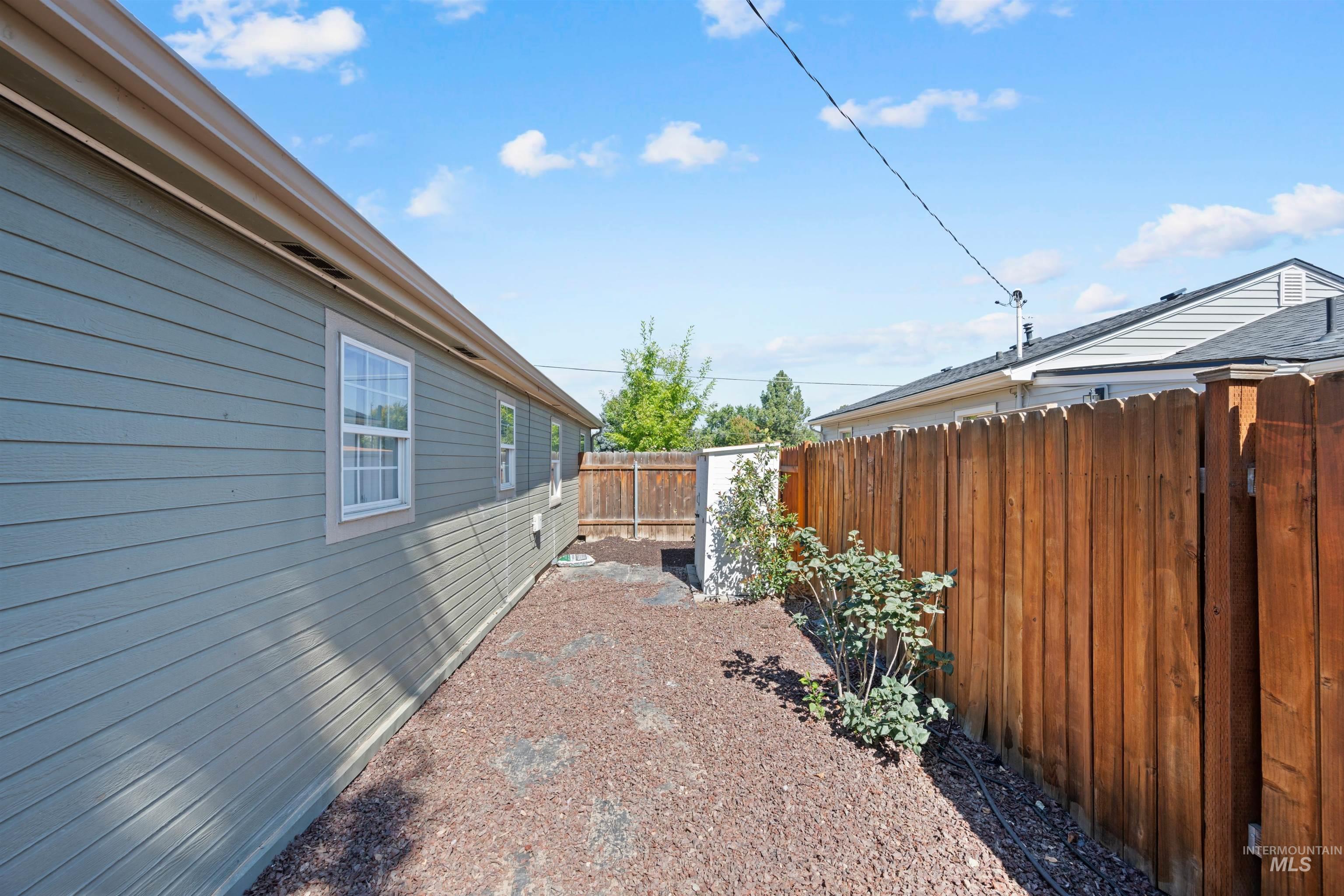 View of fenced backyard