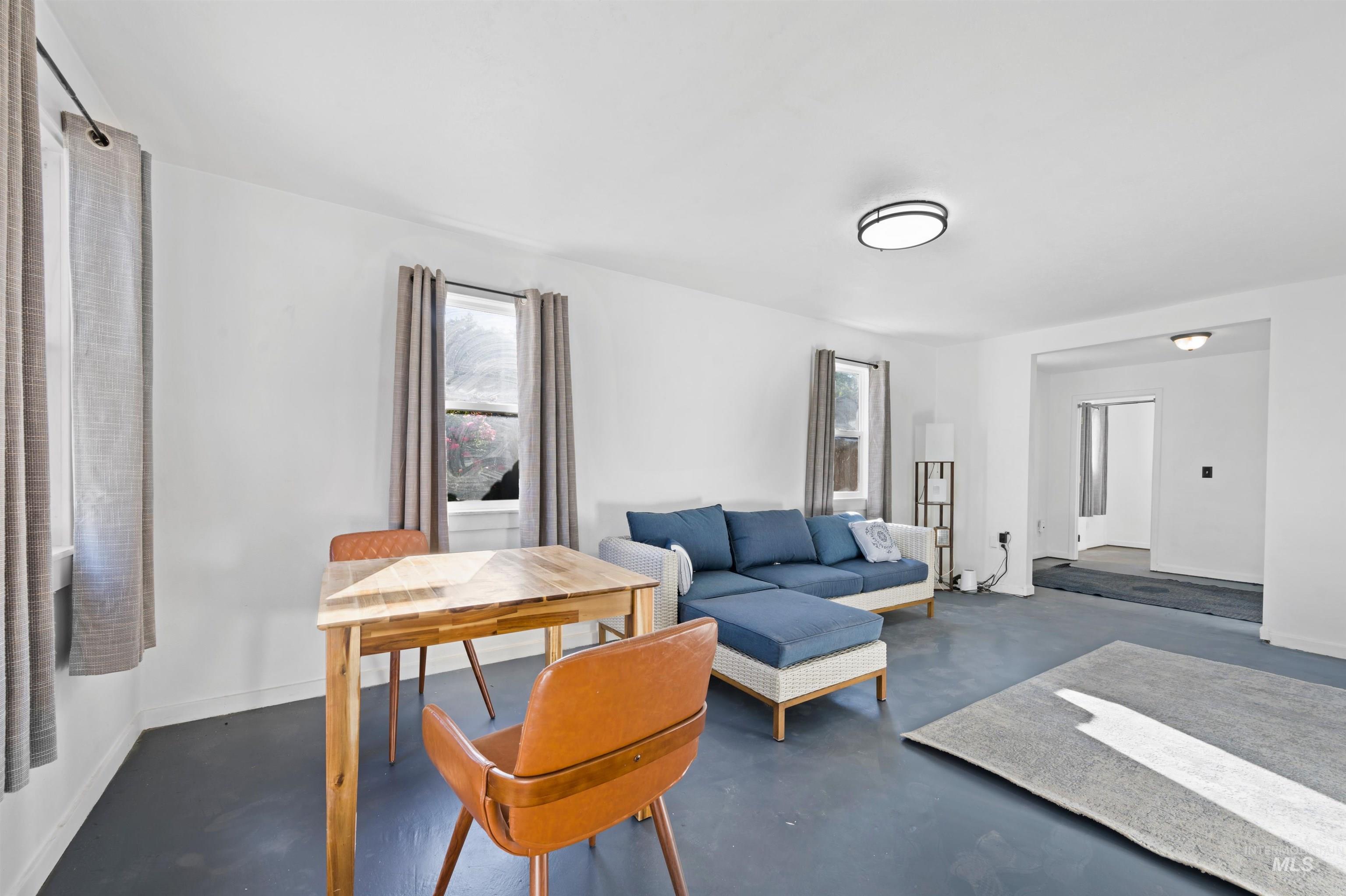 Living room with finished concrete floors