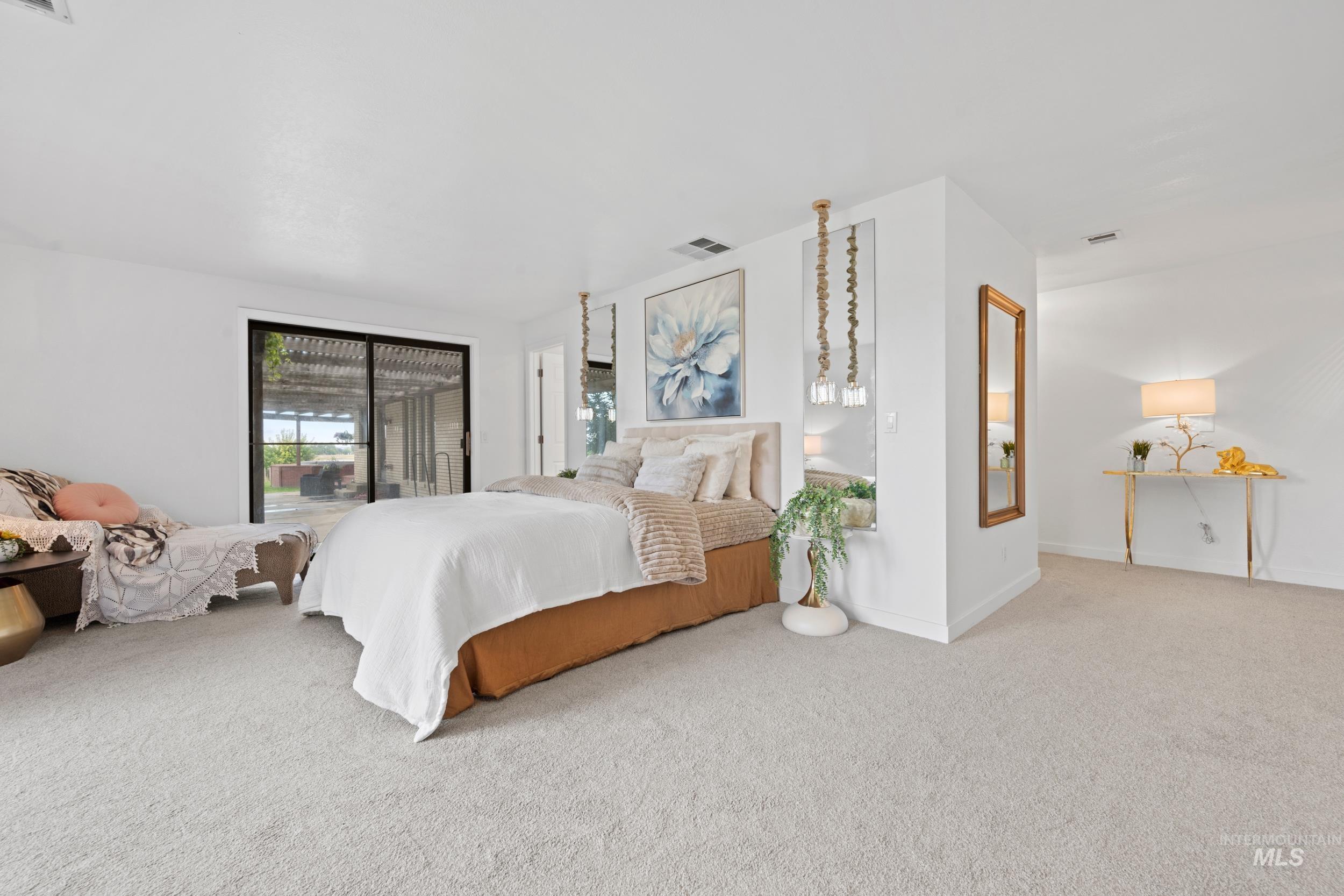 Primary Suite w/Sliding Door to Back Patio