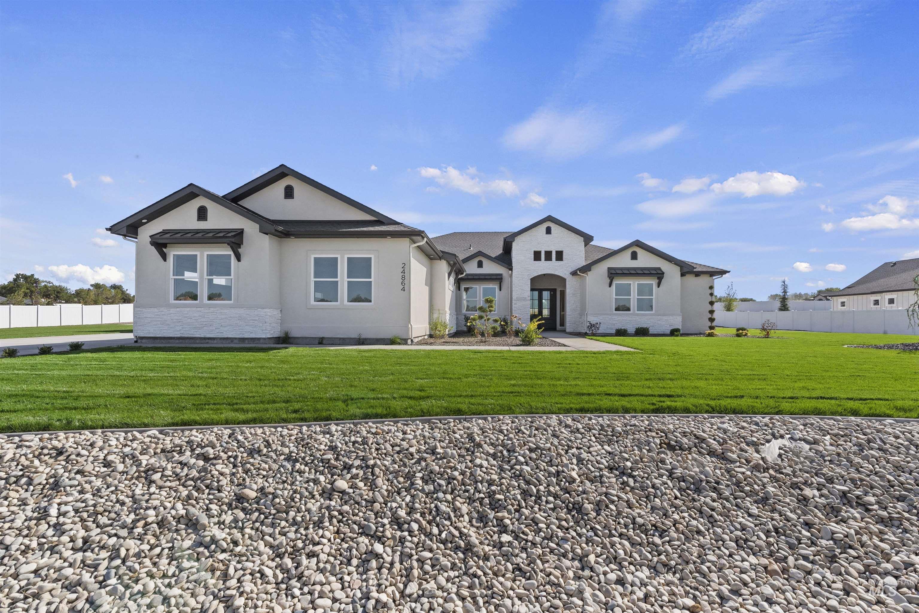 View of front of property with stucco siding