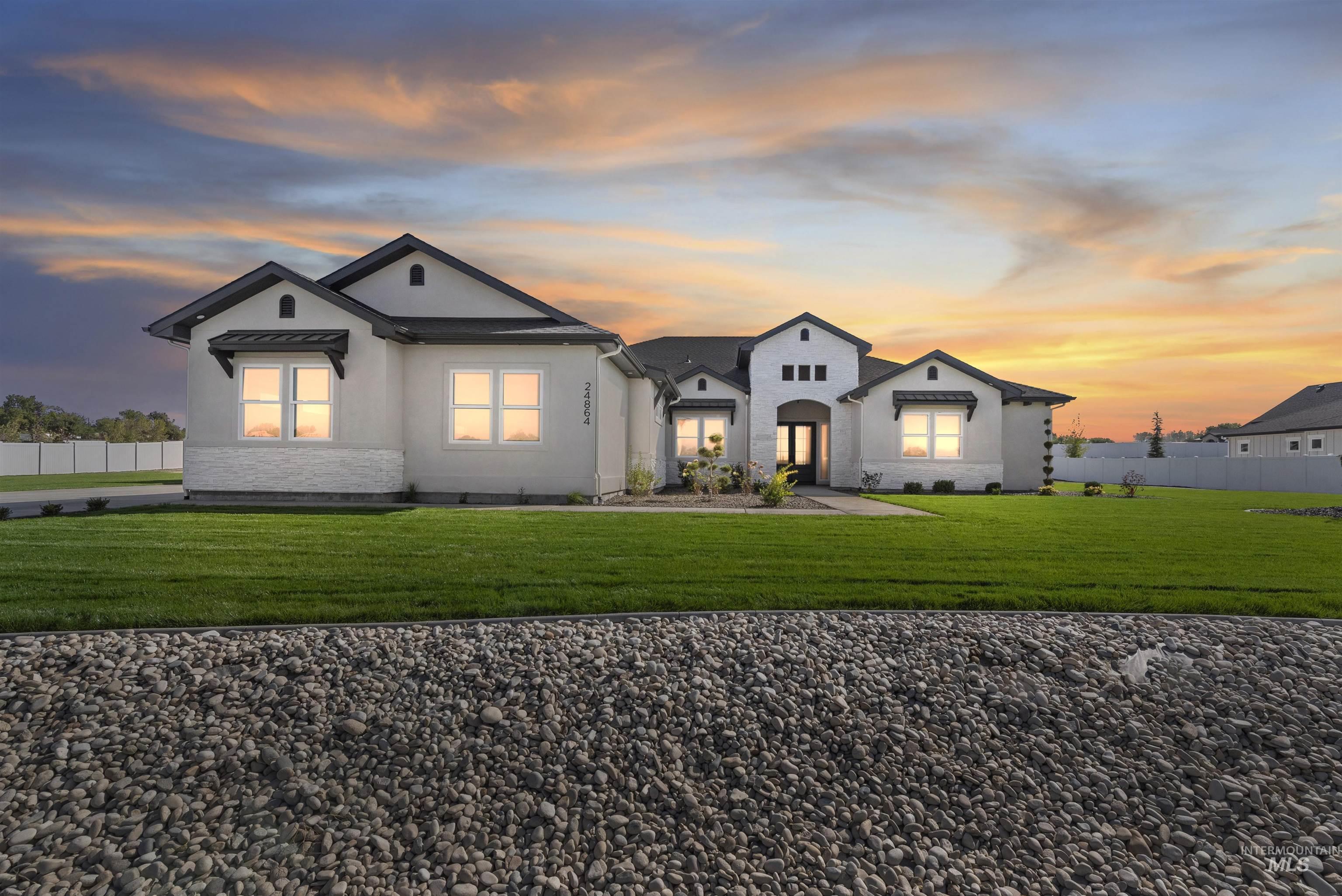 View of front of property with stucco siding