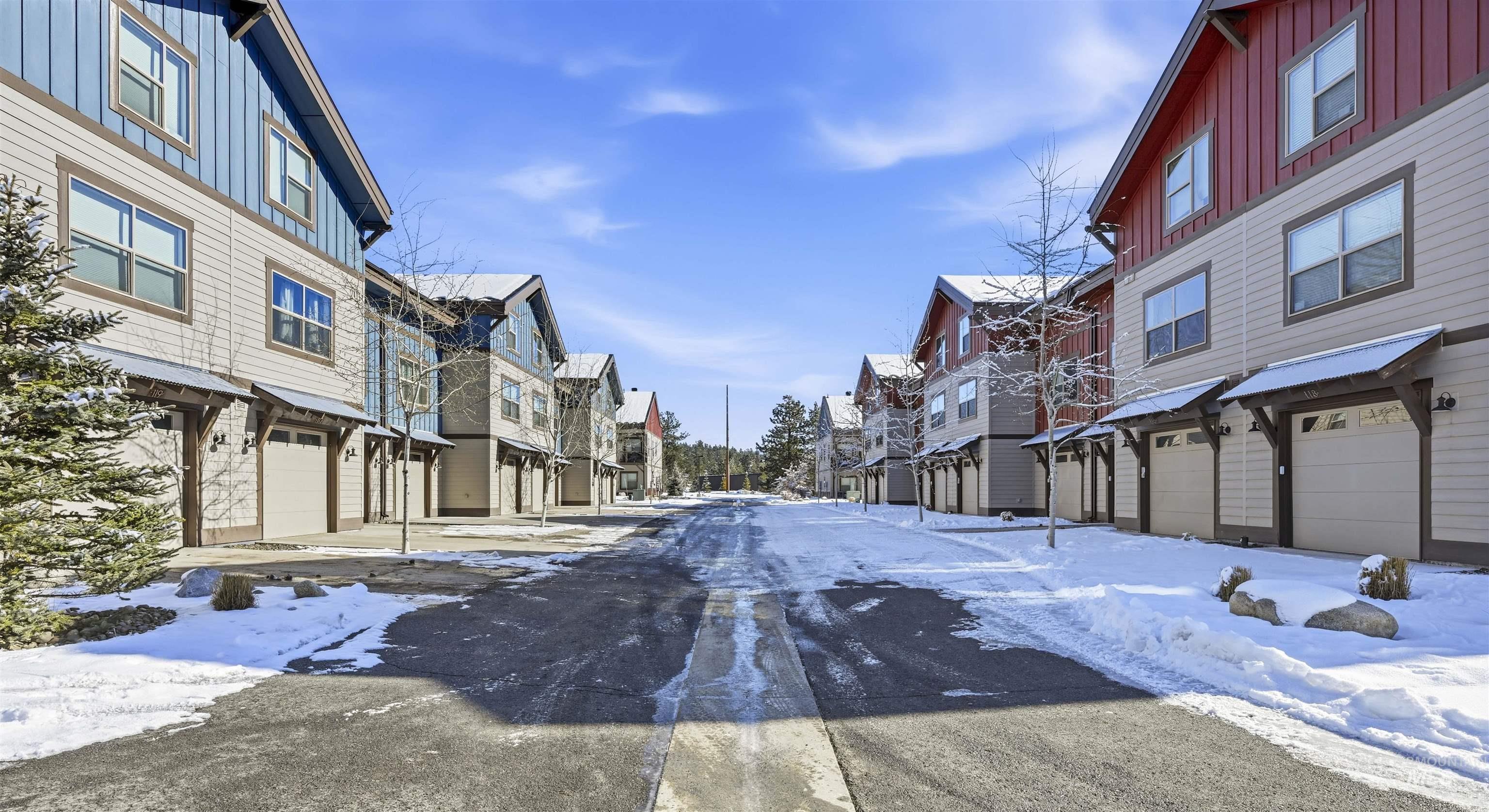 View of asphalt road with a residential view