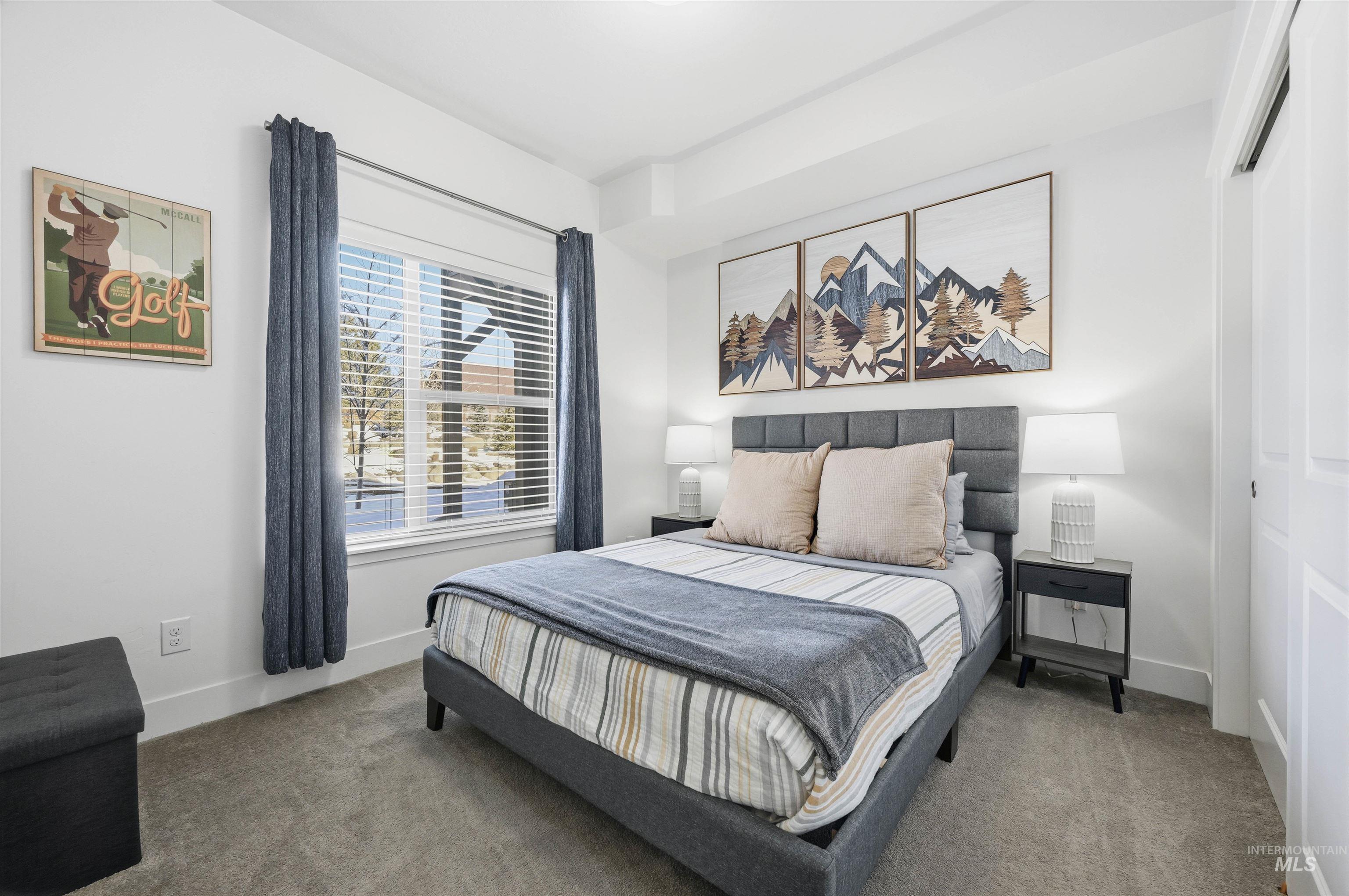 Bedroom with carpet floors and a closet