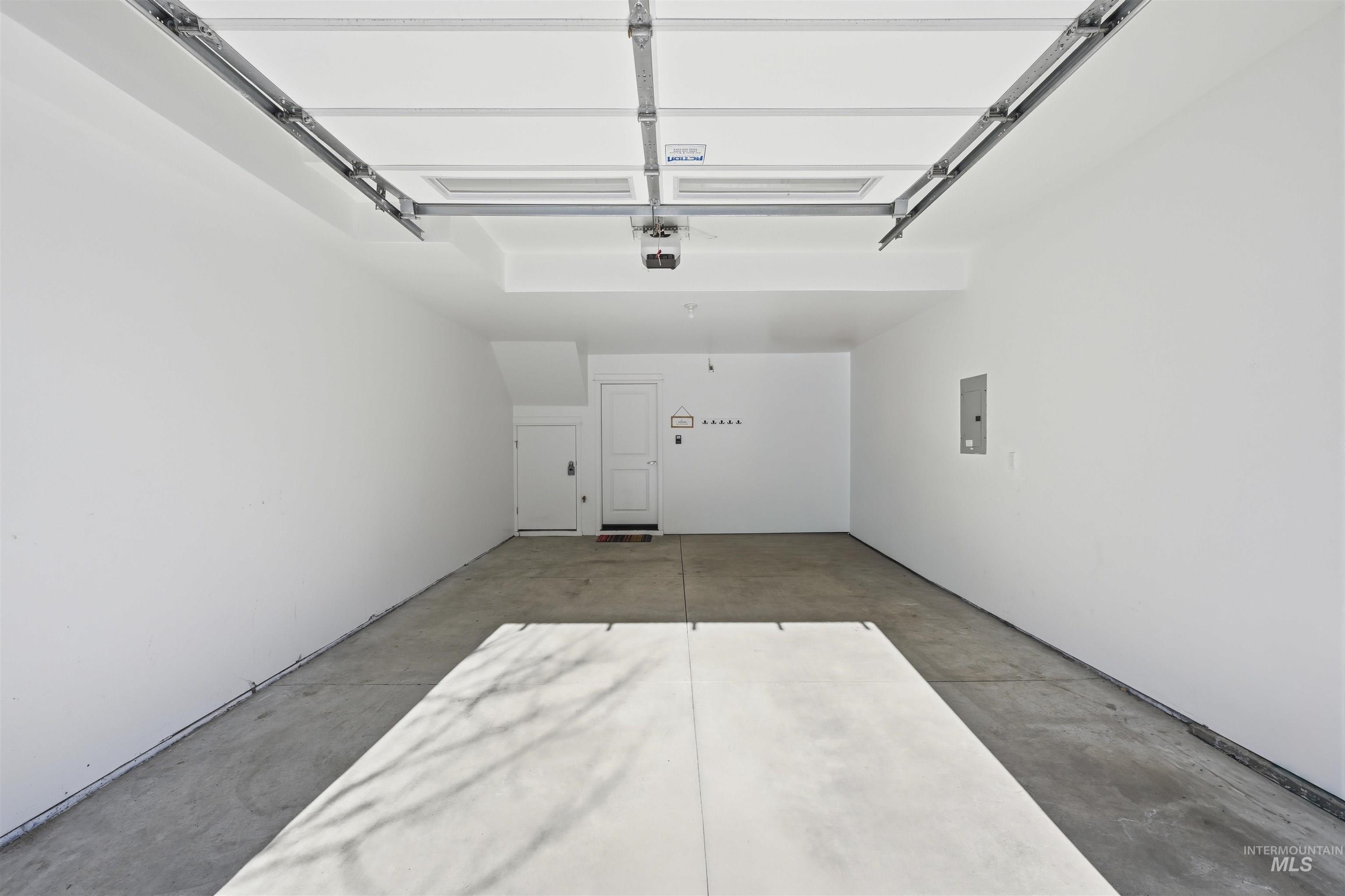 Garage featuring electric panel