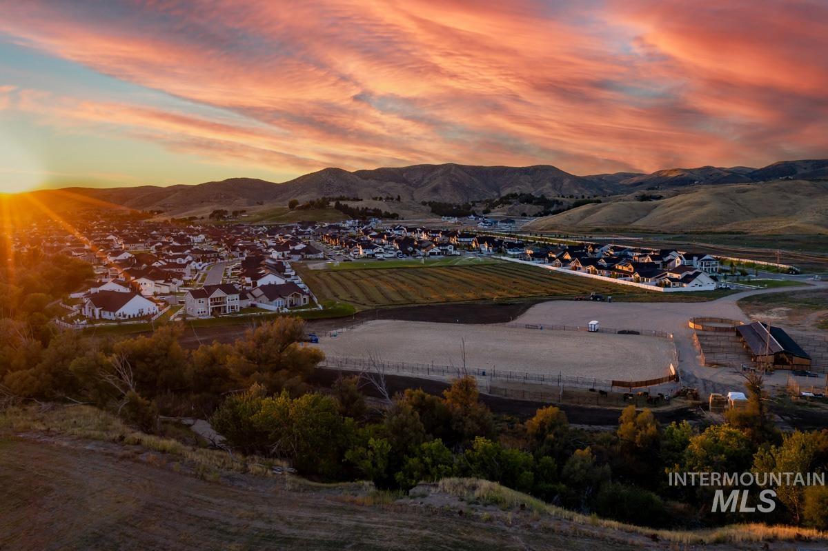 View of mountain background featuring nearby suburban area and rural landscape