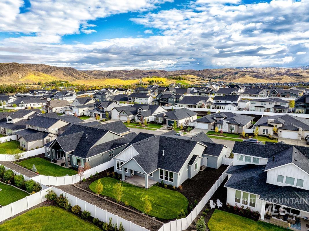 Aerial view of residential area with a mountain backdrop