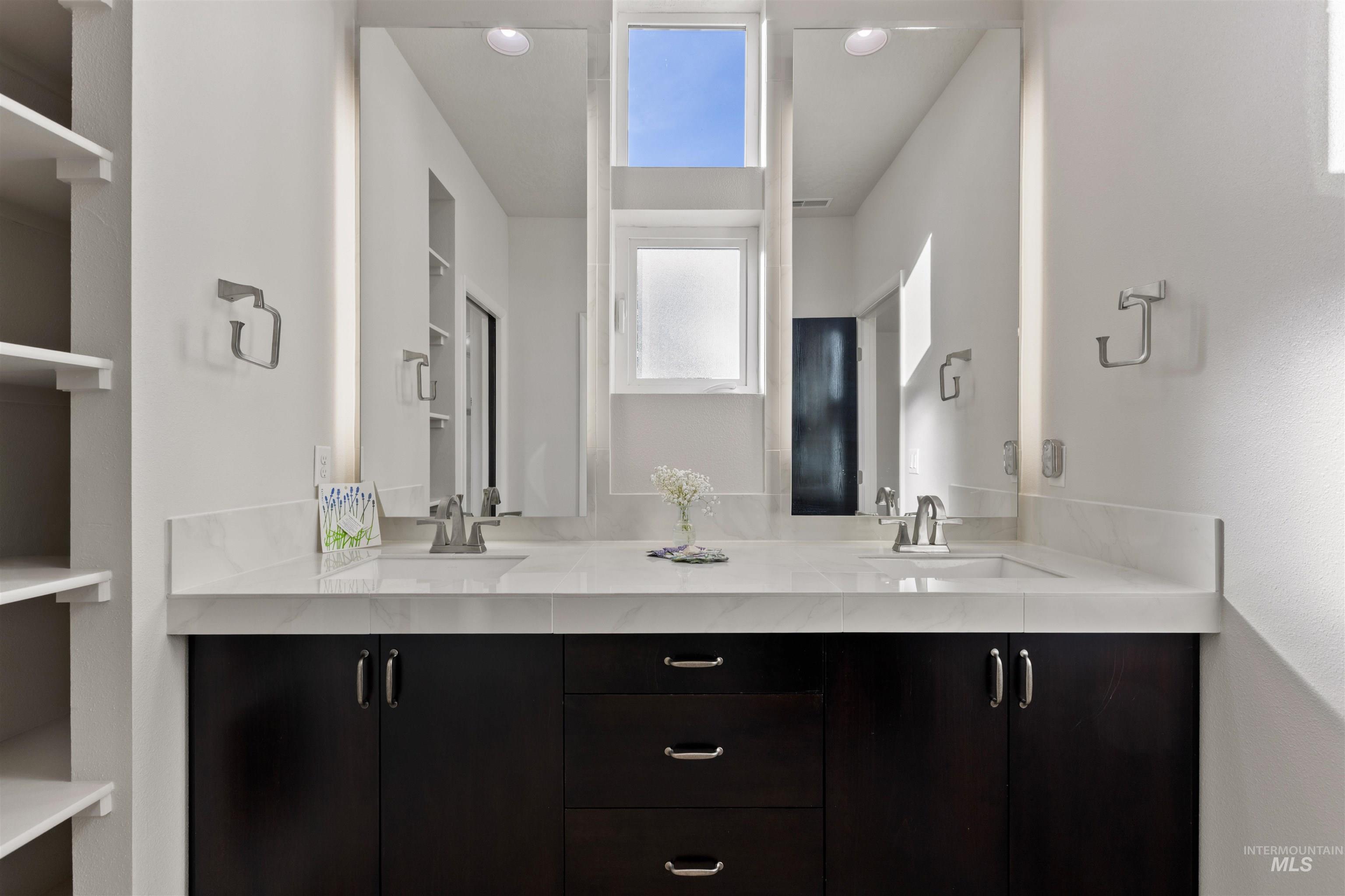Full bathroom with double vanity