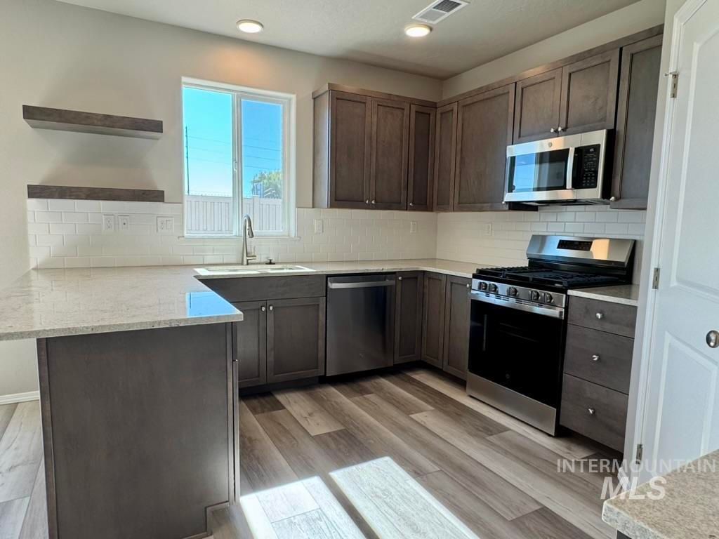 Photo of 3108 River Bluff Ct, Caldwell, ID 83605 (MLS # 98964052)
