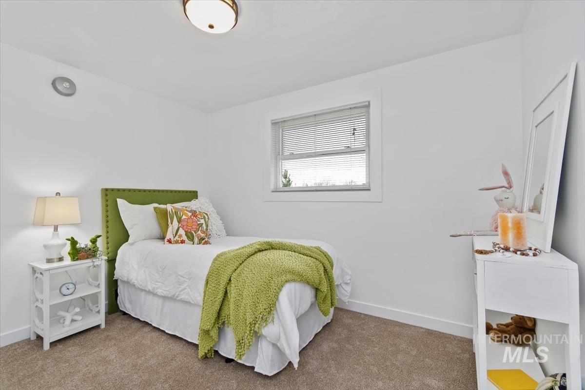 Bedroom featuring carpet