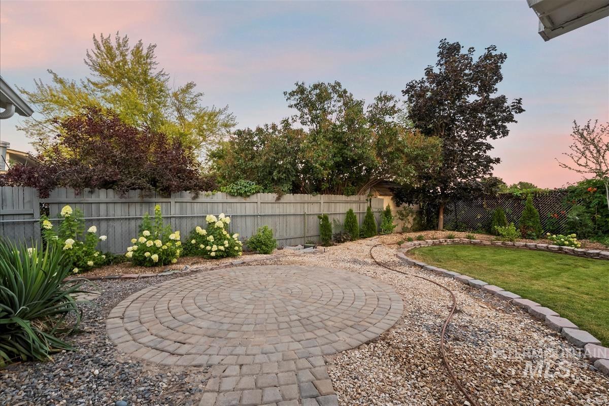 View of fenced backyard