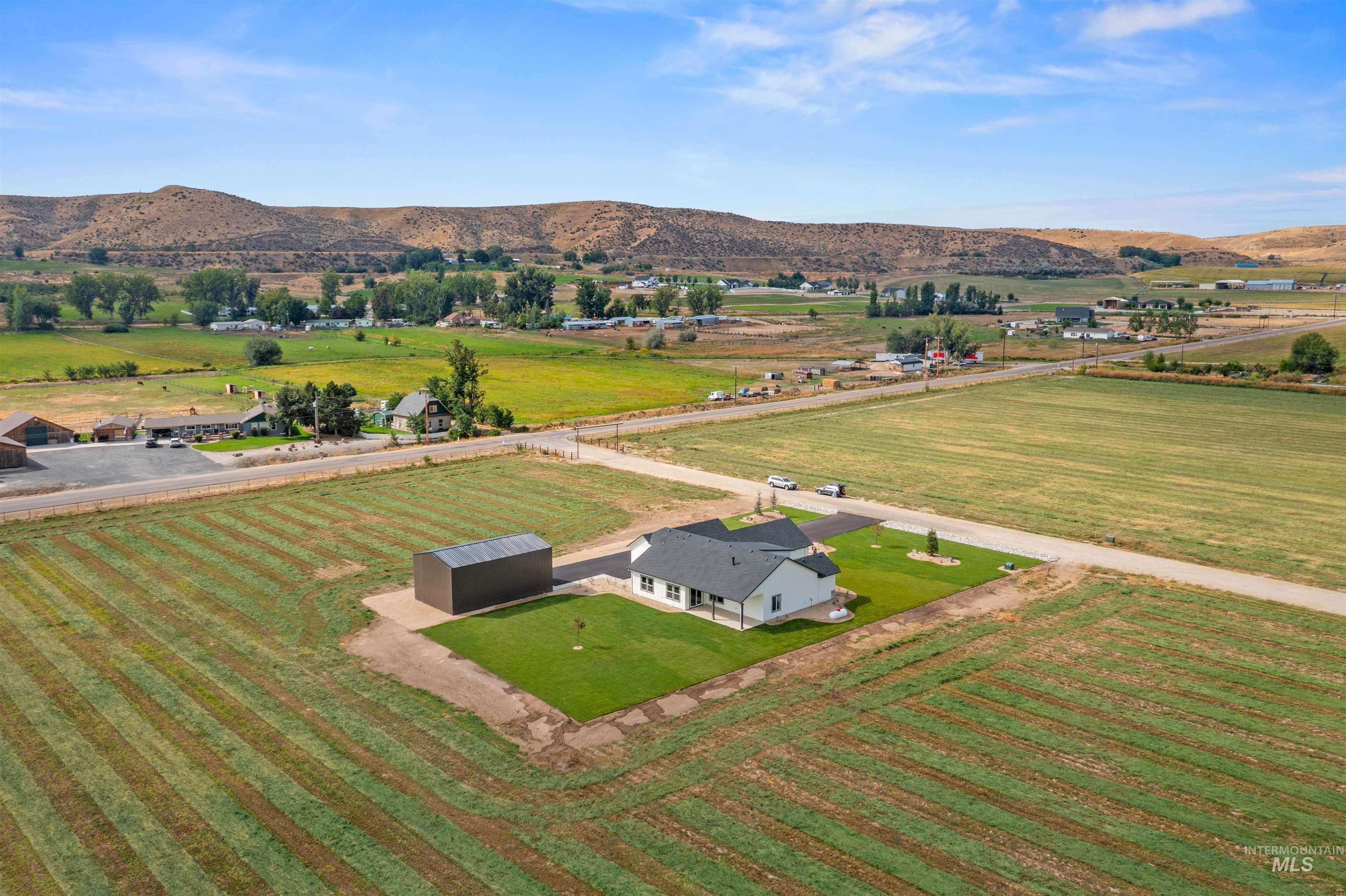 Overview of rural landscape with a mountainous background