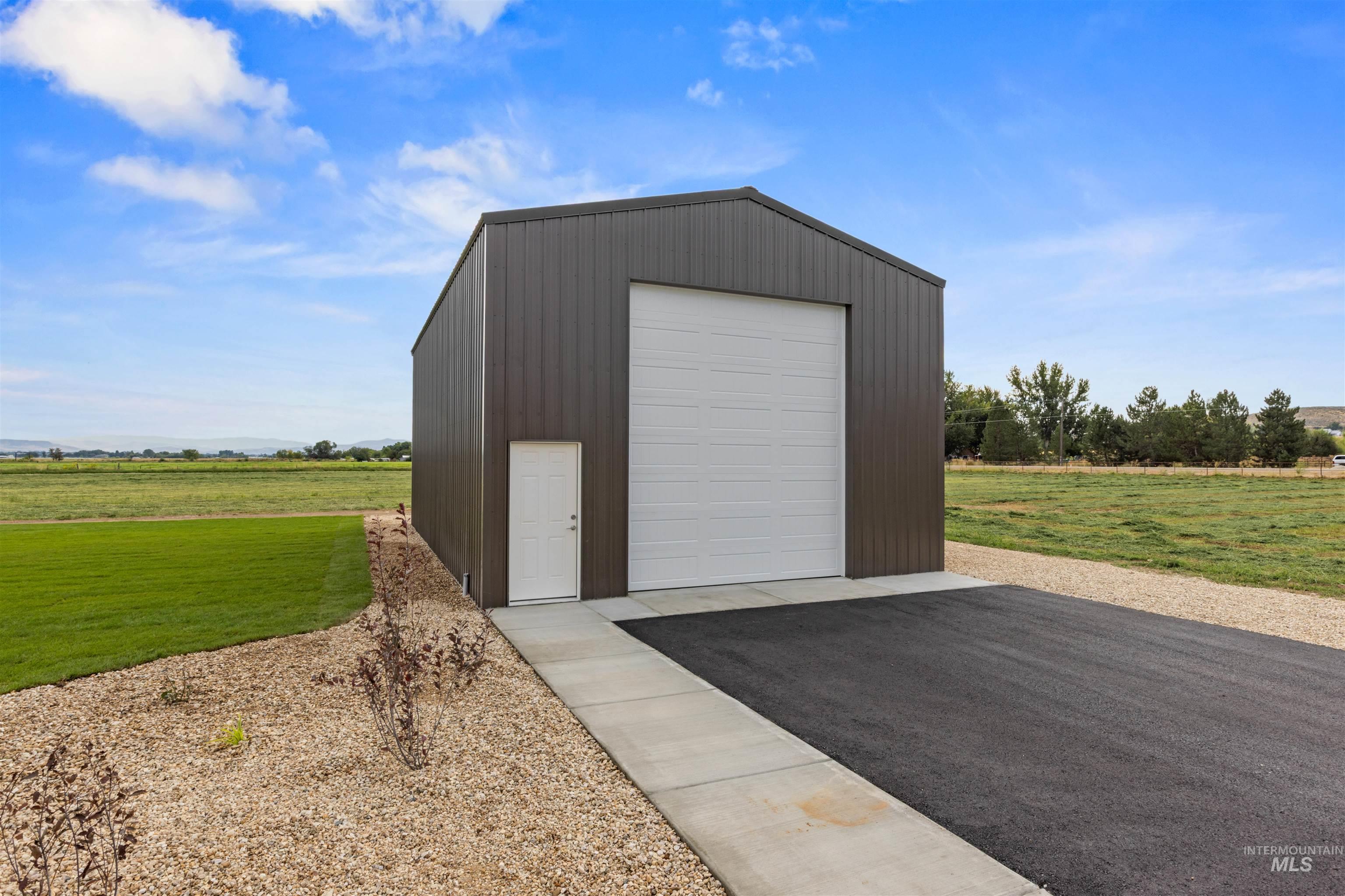 Garage featuring a view of countryside