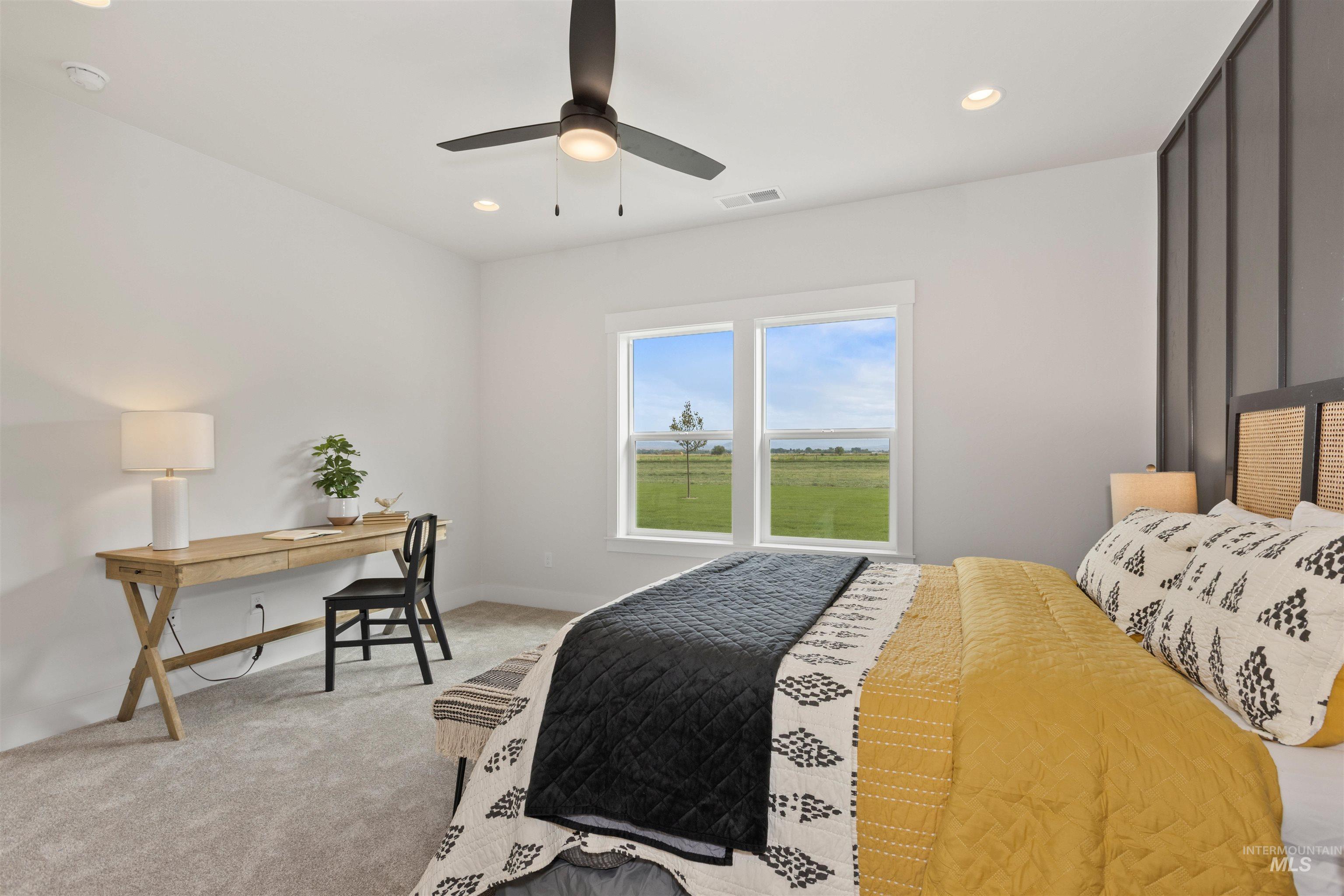 Bedroom featuring carpet flooring, ceiling fan, recessed lighting, and an office area