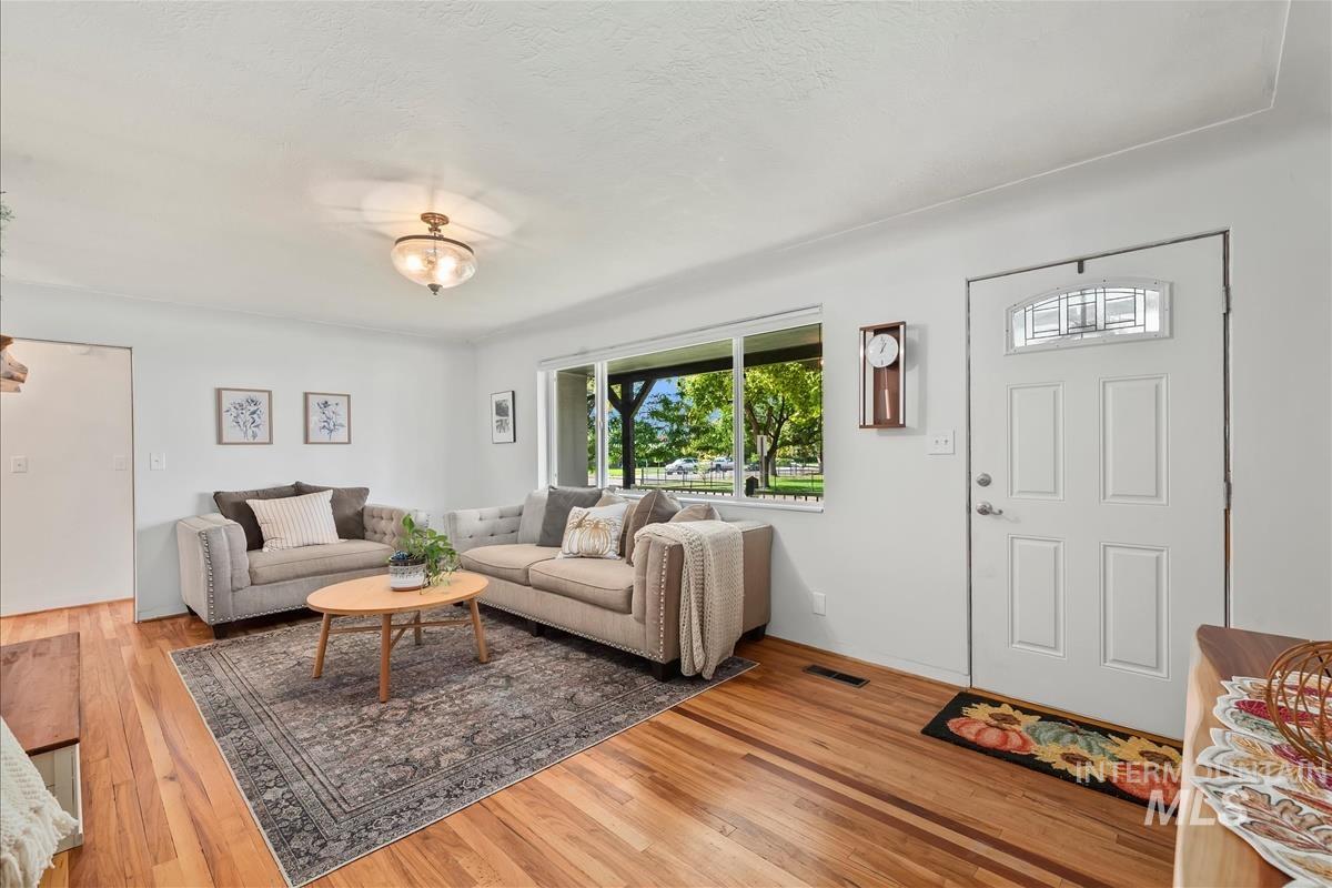 Living area featuring light wood-style floors