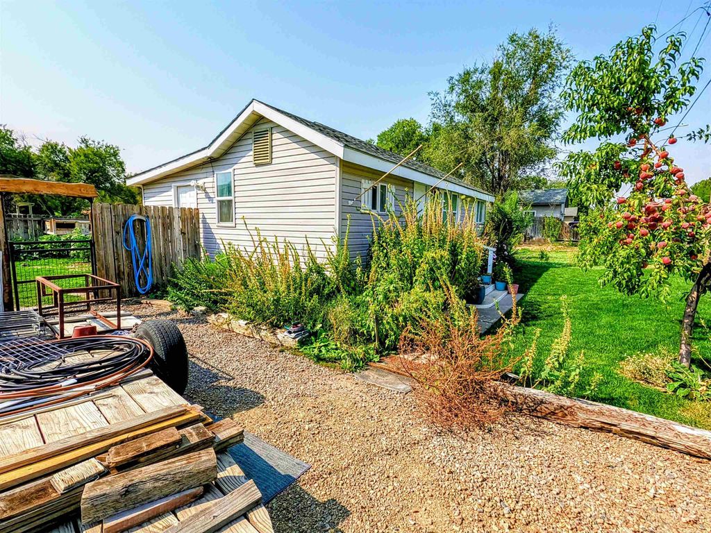 Photo of 595 S 14th E, Mountain Home, ID 83647 (MLS # 98958177)