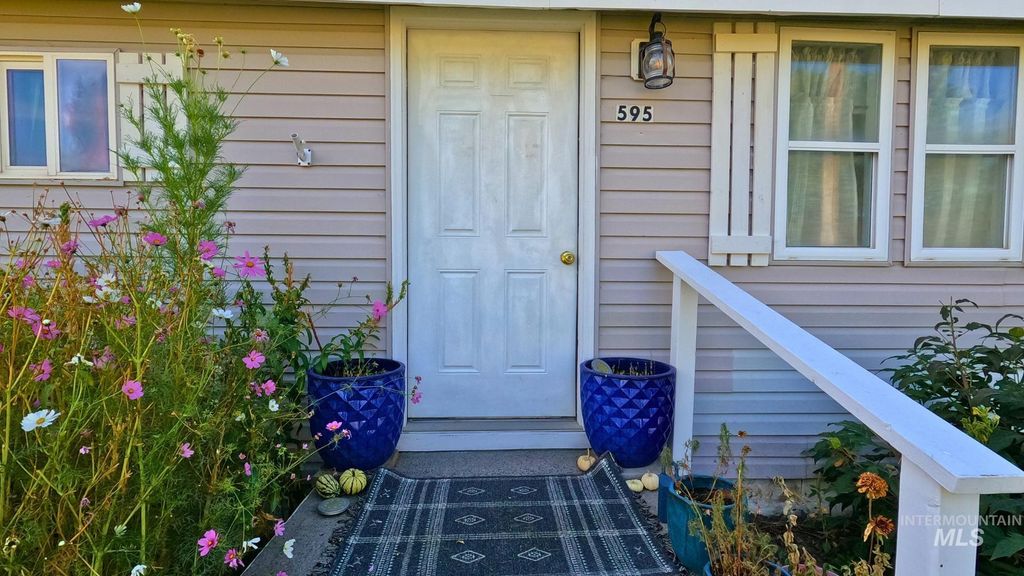 Photo of 595 S 14th E, Mountain Home, ID 83647 (MLS # 98958177)