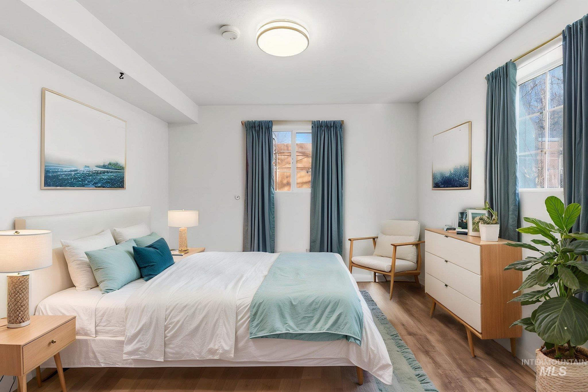 Bedroom with wood finished floors