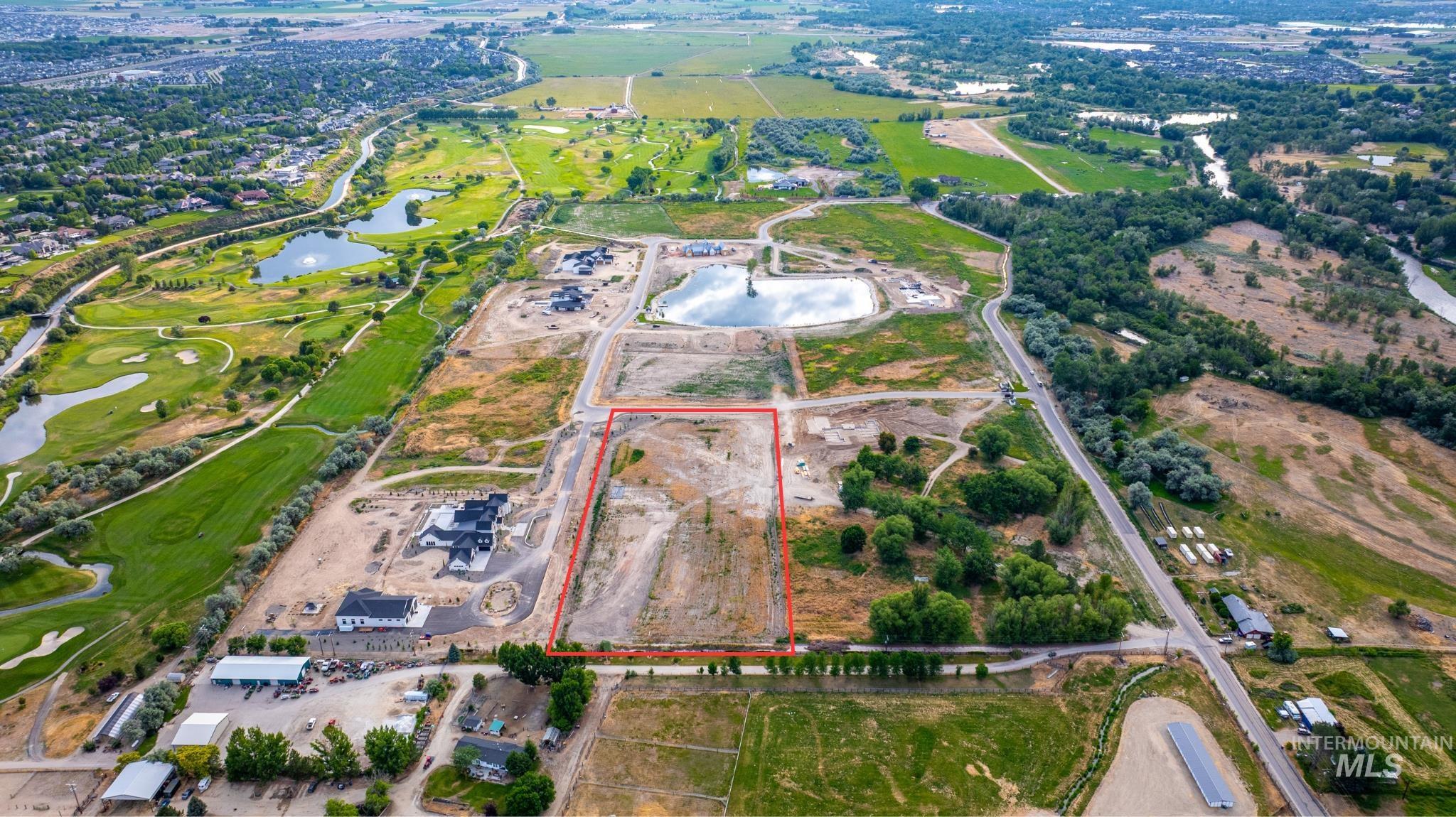 View of property location with property boundaries highlighted and a large body of water