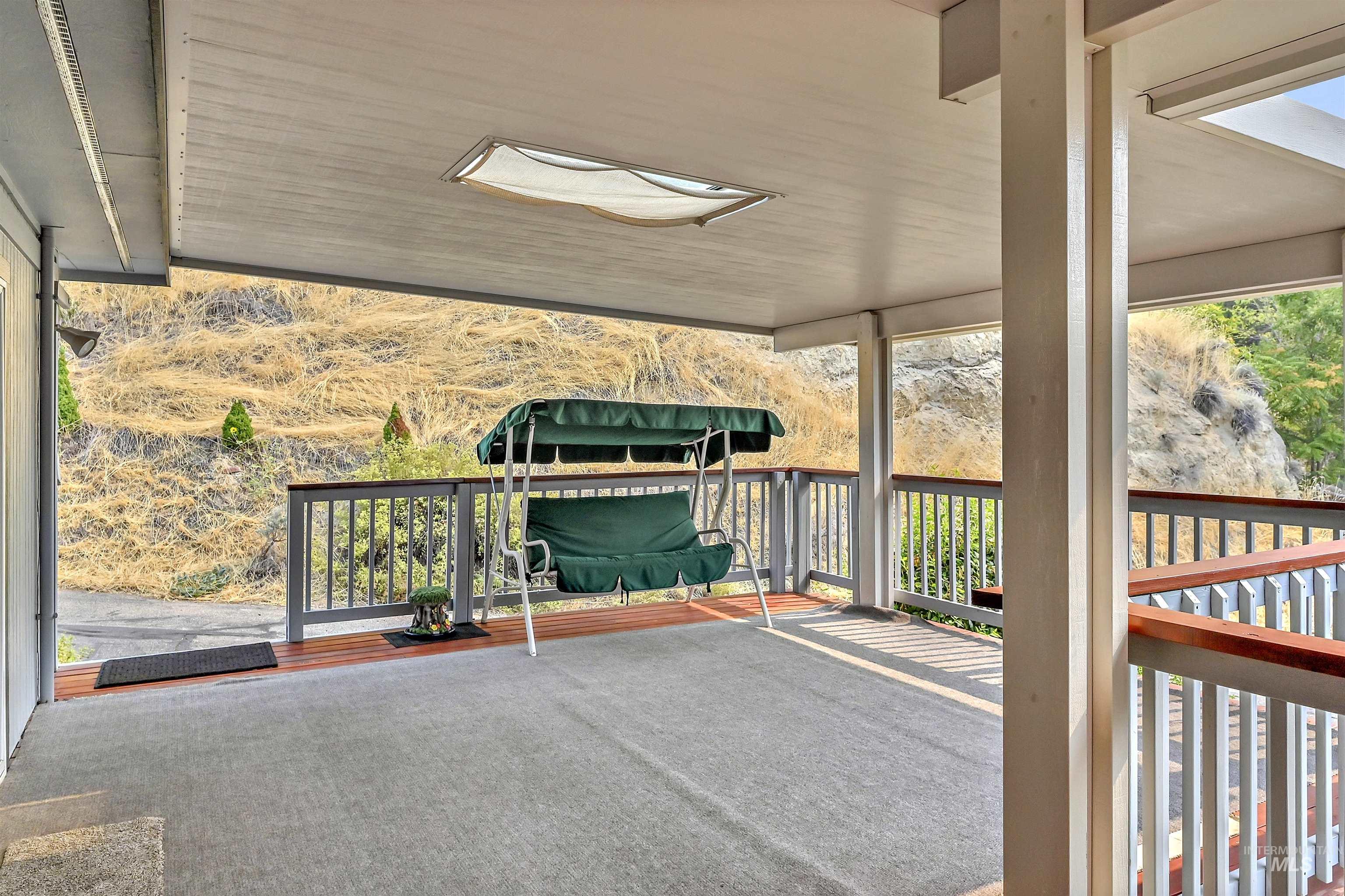Unfurnished sunroom with healthy amount of natural light