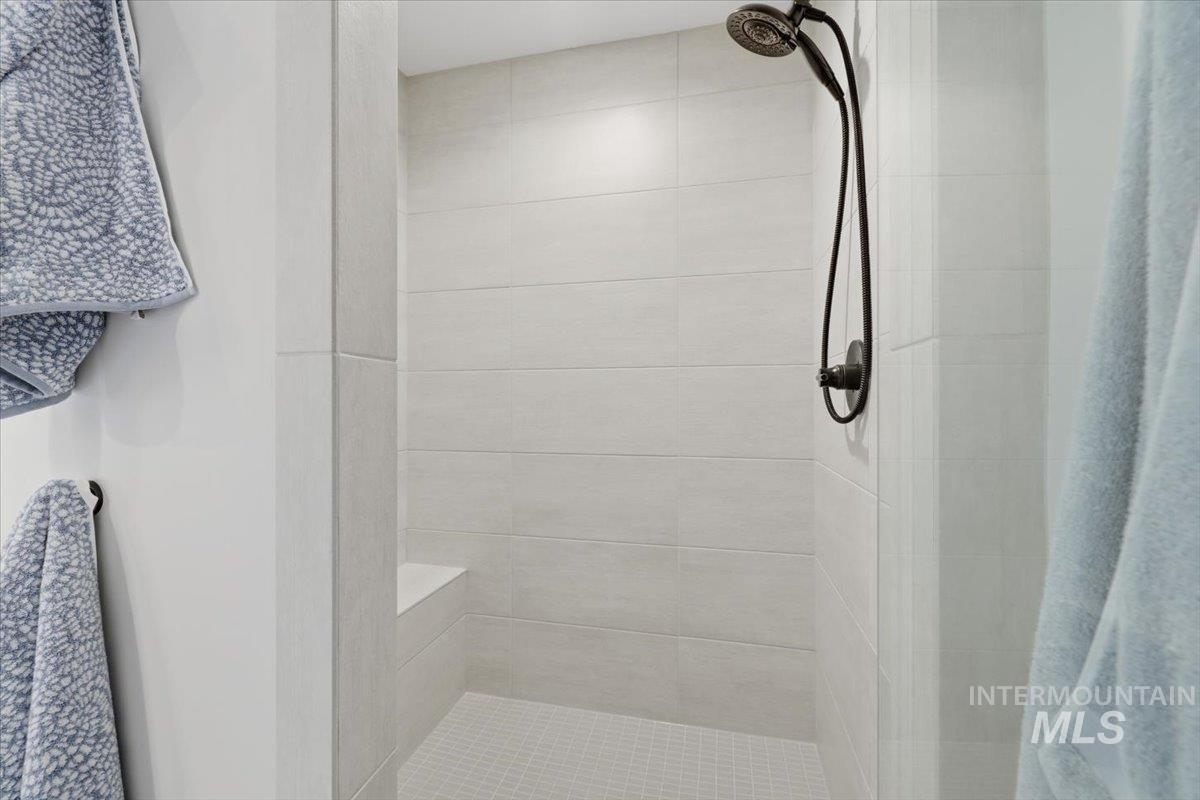 Bathroom featuring a shower stall