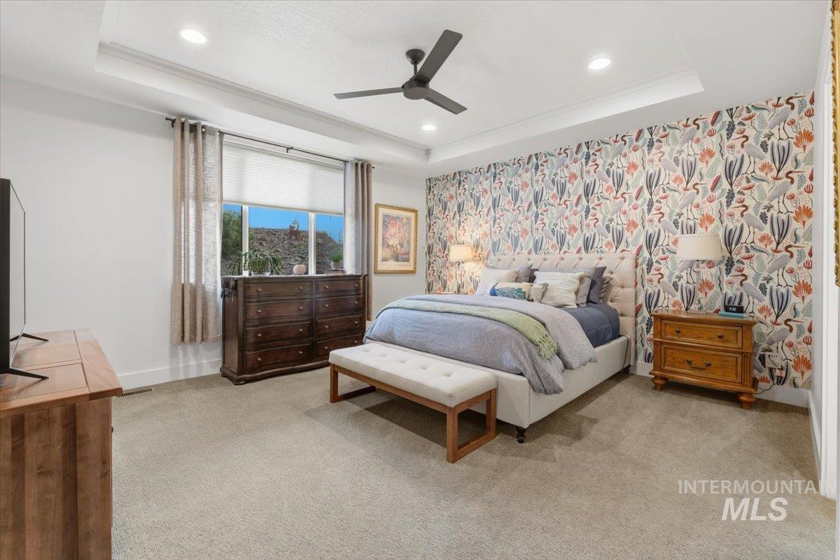 Bedroom with ceiling fan, light carpet, recessed lighting, wallpapered walls, and ornamental molding
