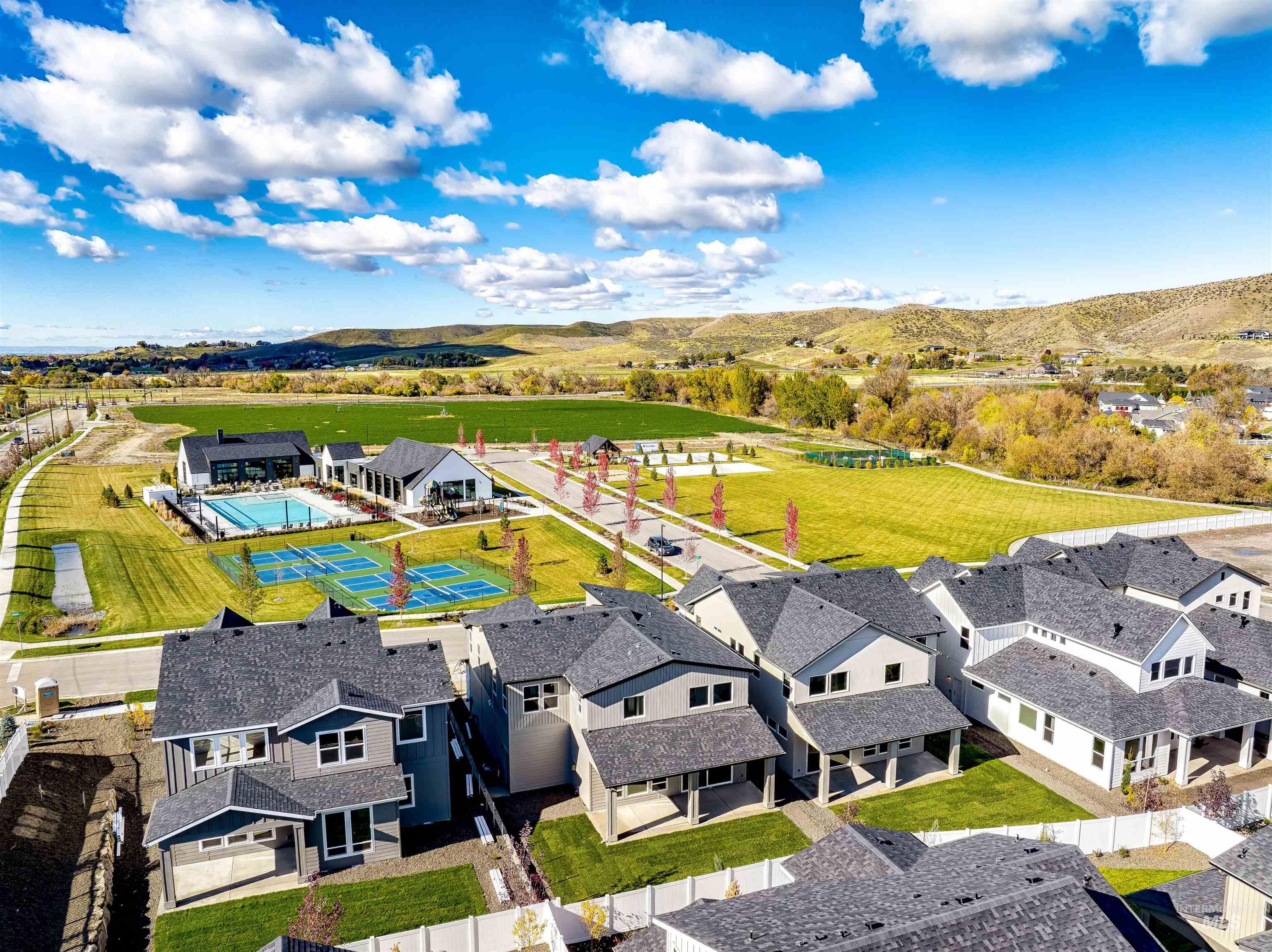 Aerial perspective of suburban area with mountains