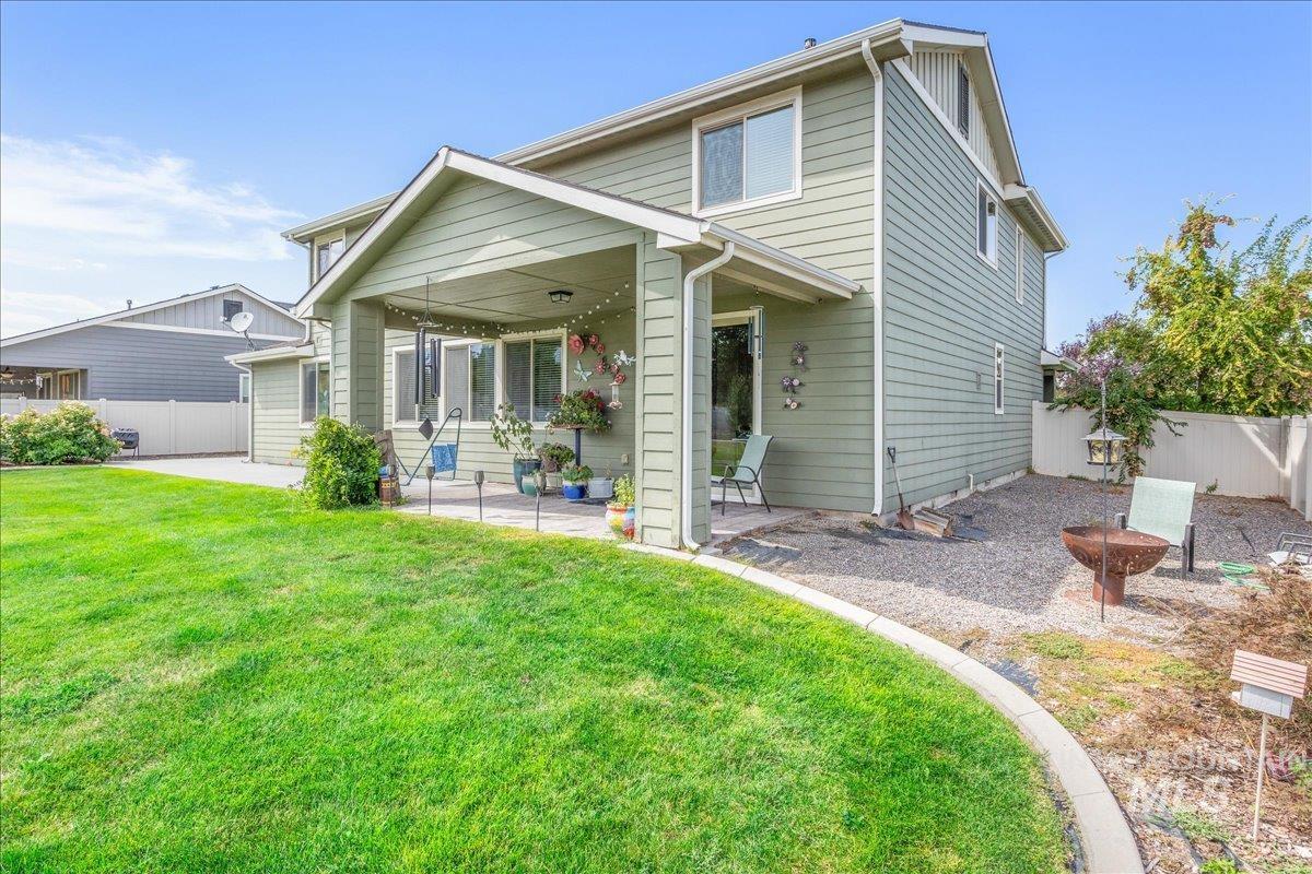 Rear view of house with a patio area